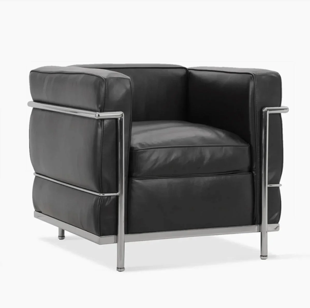 classic cube chair. Black leather cushions supported in chrome frame.