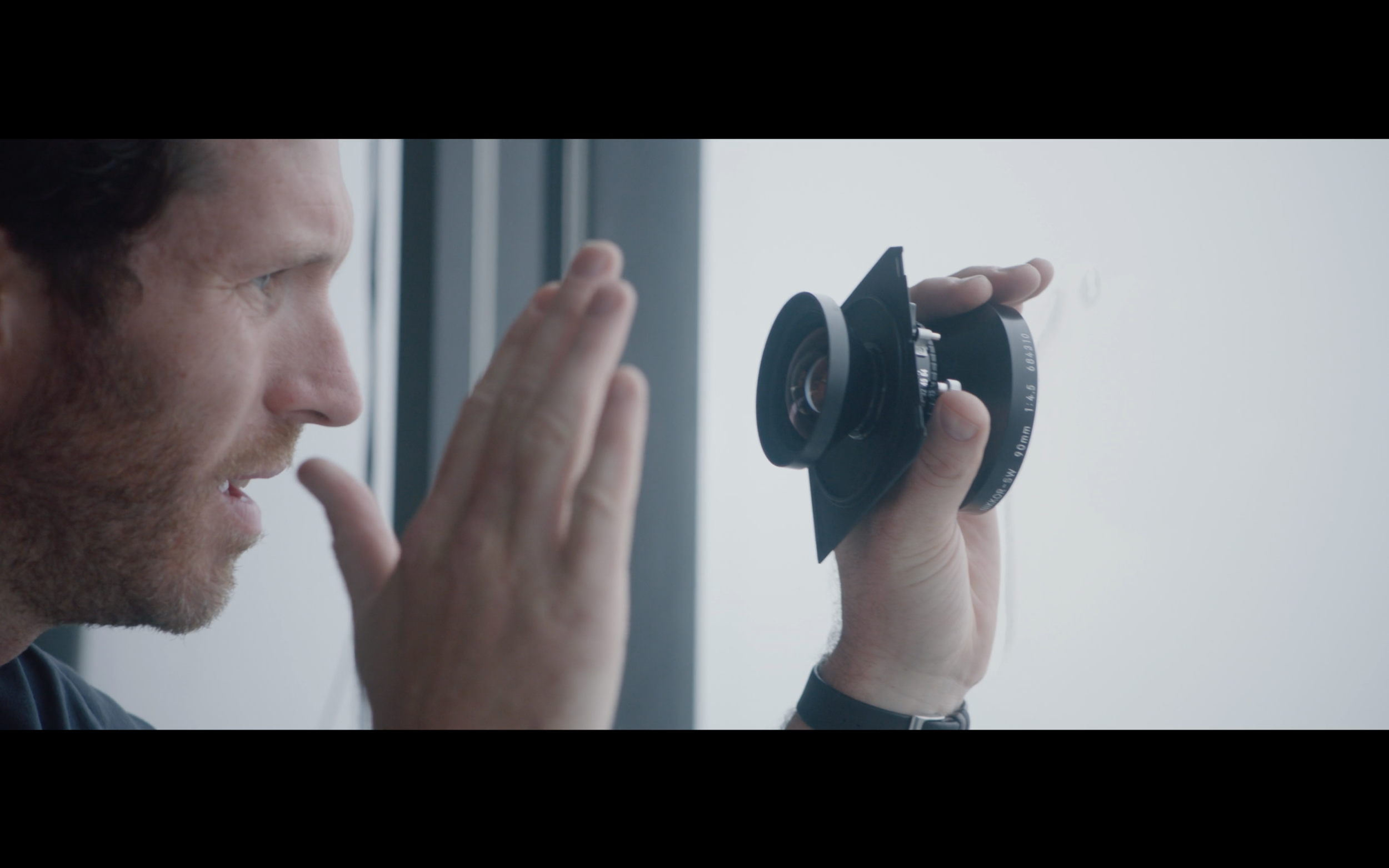 17_BrendanBarry_lens_hand.png