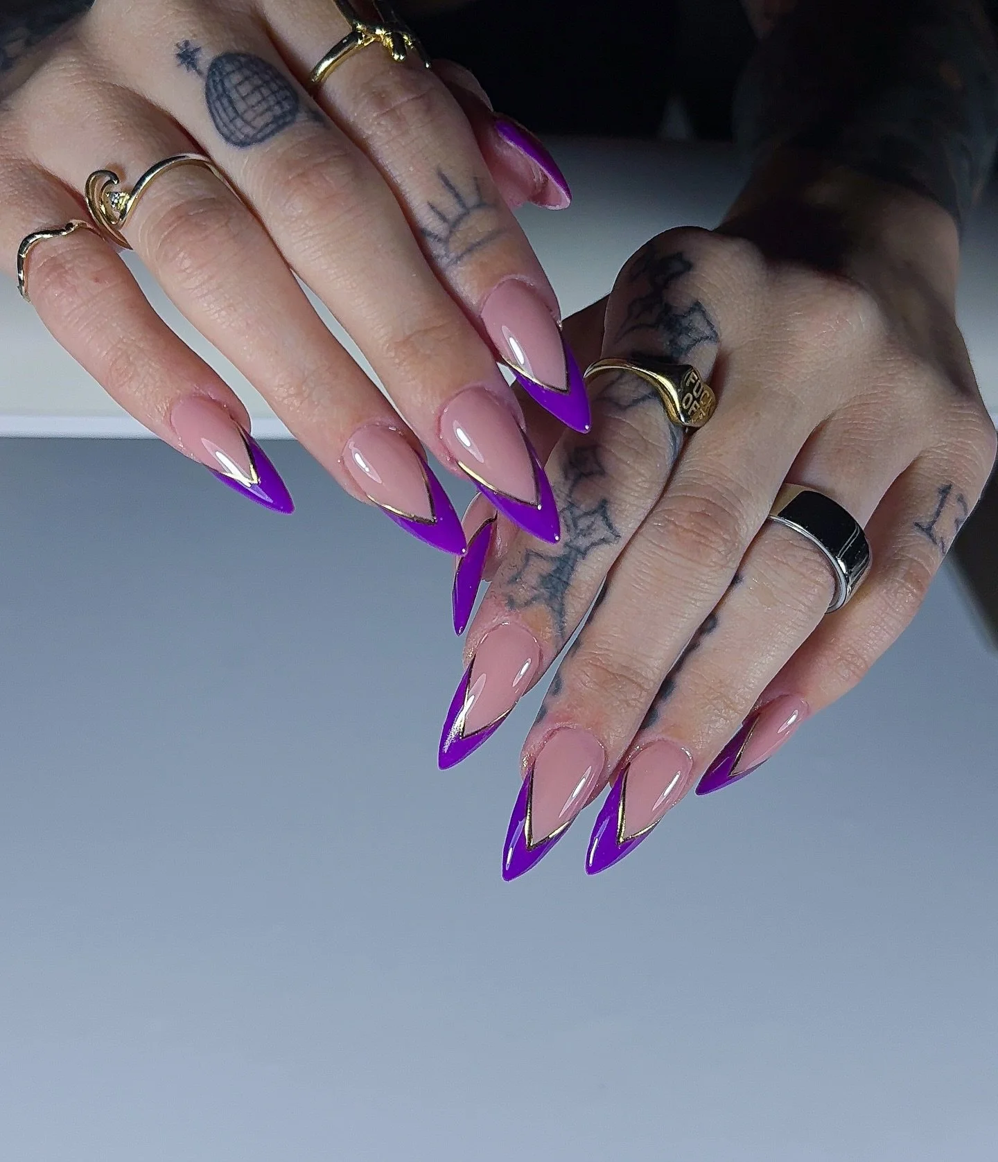 Purple French, but make it dangerous 💜

Sharp almond Gel-X with vivid violet French tips
finished with a delicate gold chrome outline for the perfect contrast.

Bold, clean, and impossible to ignore.

🎀 A statement set with a feminine edge
🌿 Gold 