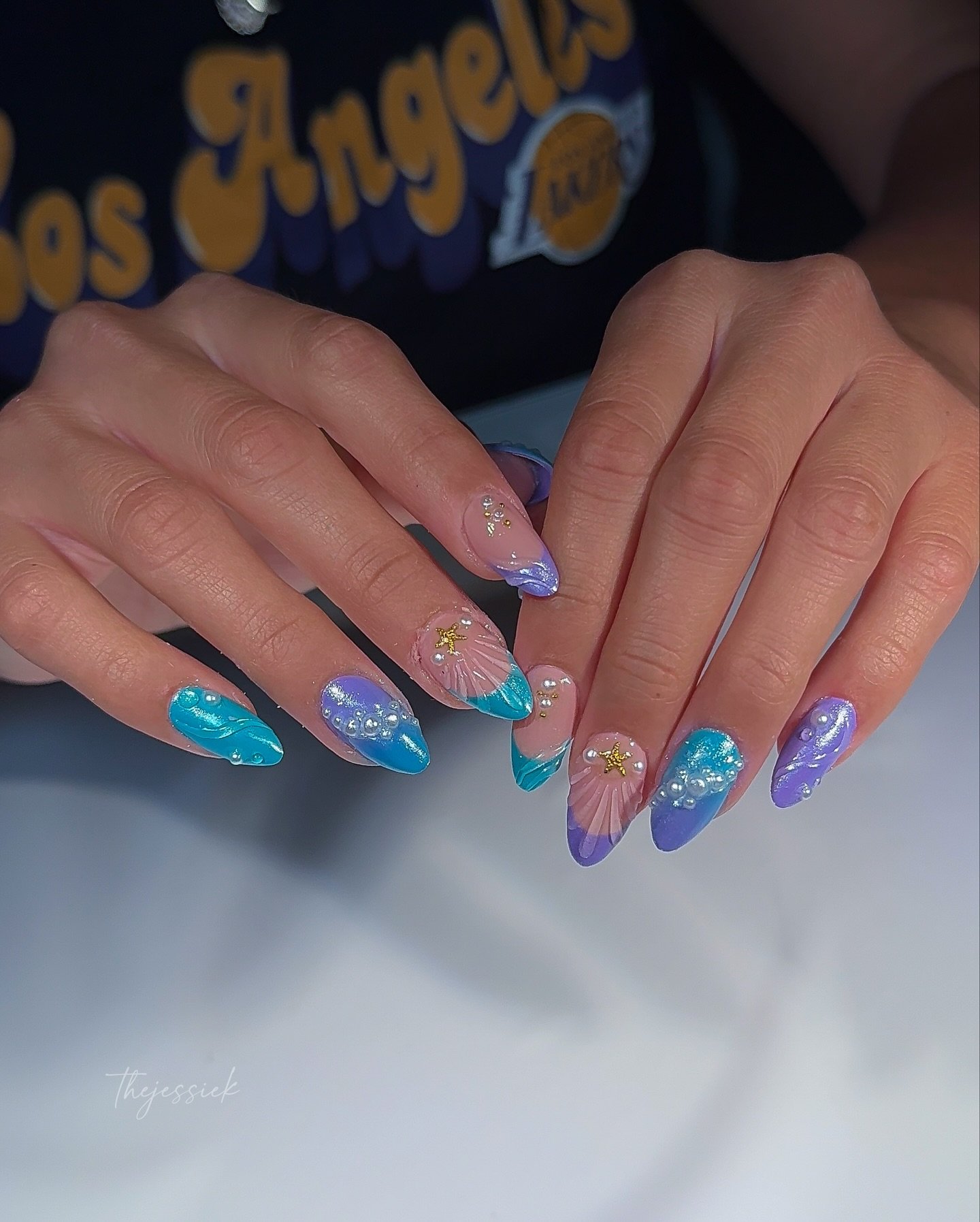 Mermaid nails, but make them dreamy 🧜&zwj;♀️🫧✨

Ocean blues, seashell details, pearls &amp; starfish on a Gel-X set. 🌊

Gel-X extensions + Russian manicure
📍Private nail studio in Arcadia, CA
Appointment only | DM to book 🤍

#ArcadiaNails #Pasad