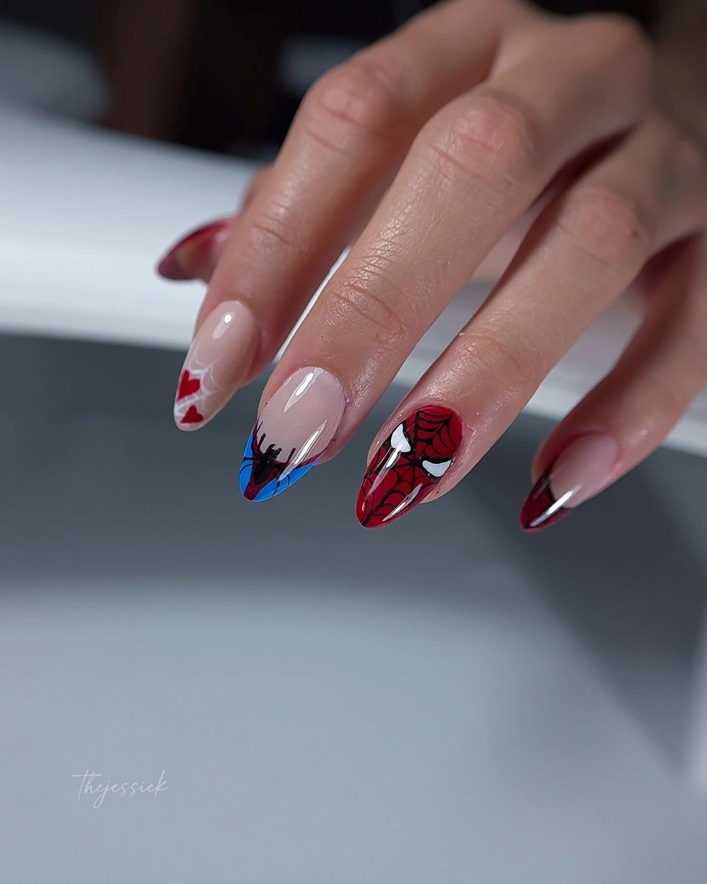 🕷️ Spider-Man inspired nails, just in time. ❤️💙

Hand-painted comic details, spider webs, and 3D-inspired artwork&mdash;all created with structured gel for a design that&rsquo;s both beautiful and durable.

Looking for detailed nail art that still 