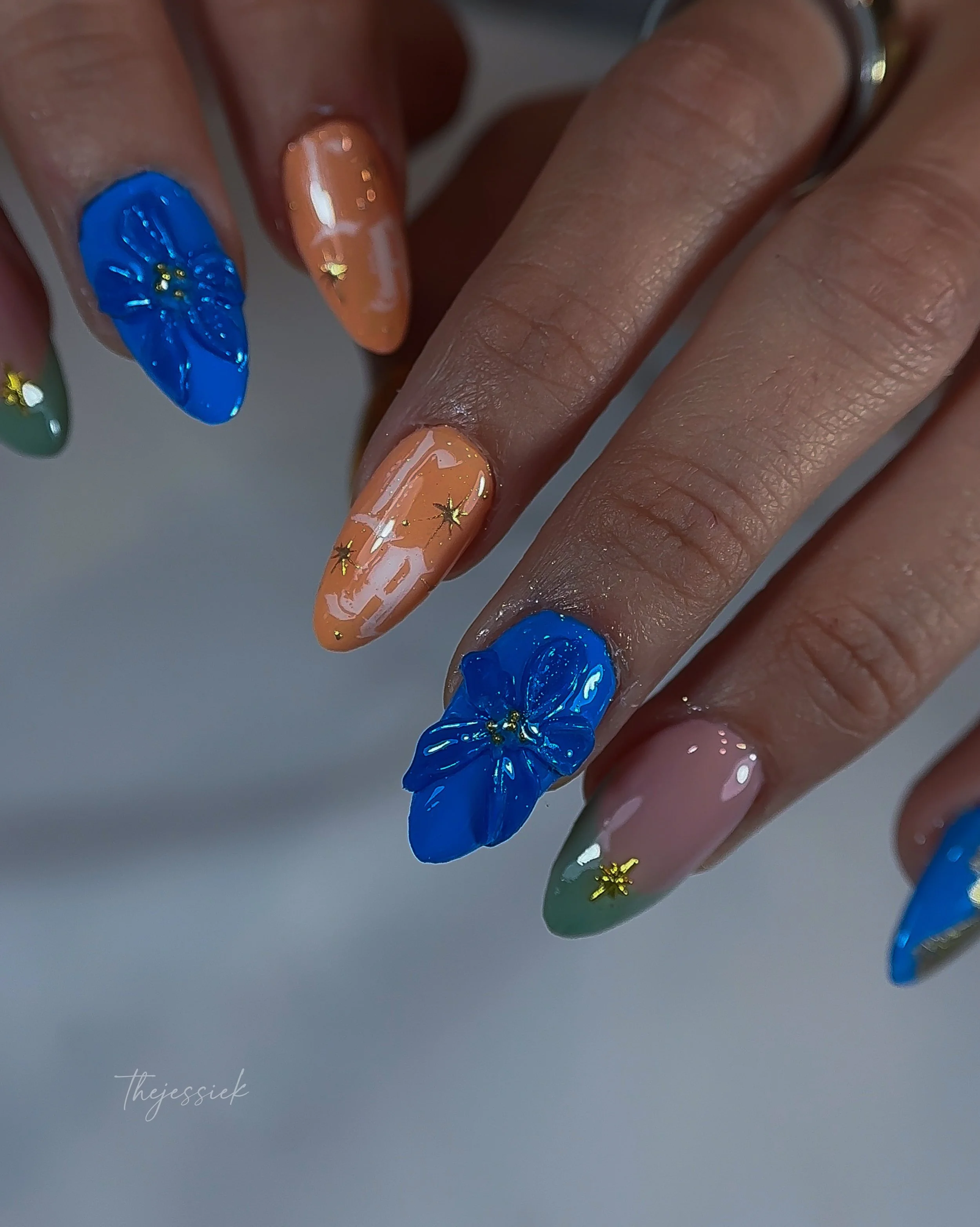 Dodgers inspired, but make it custom 💙⚾️✨

My client came up with this design, and we brought her vision to life with a mix of nail stamping, chrome details, and bold 3D florals.

I love when my clients bring their own creative ideas &mdash; it make