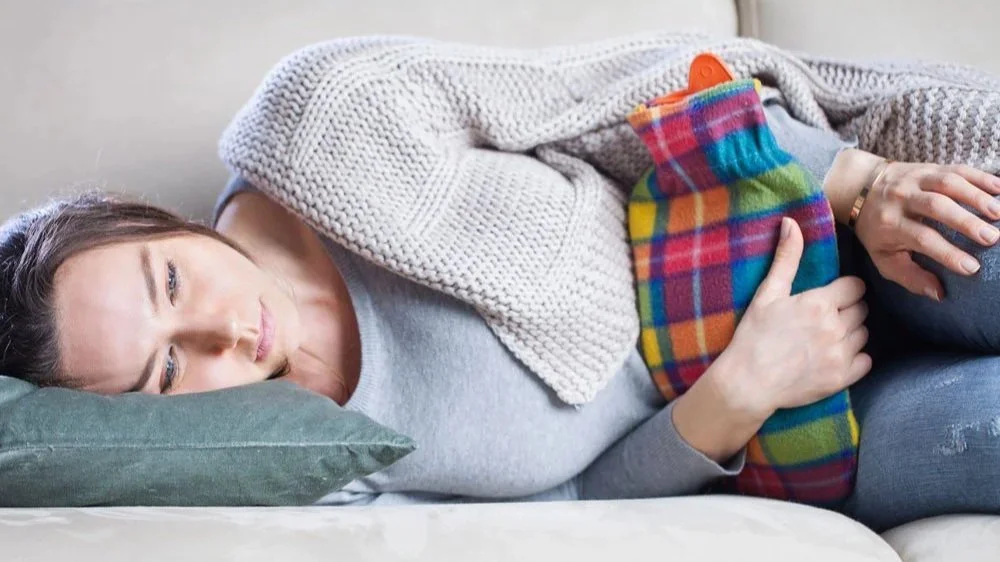 woman experiencing pms symptoms