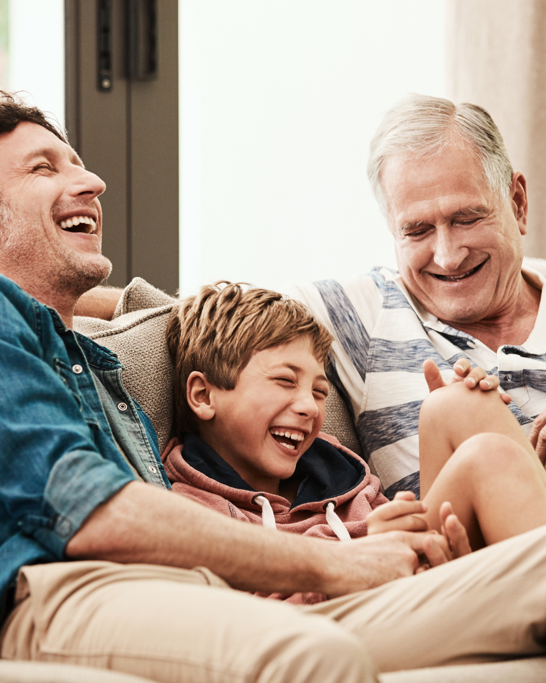 Father, son, and grandfather enjoying time together — supporting men's vitality and wellness with acupuncture in NW Calgary