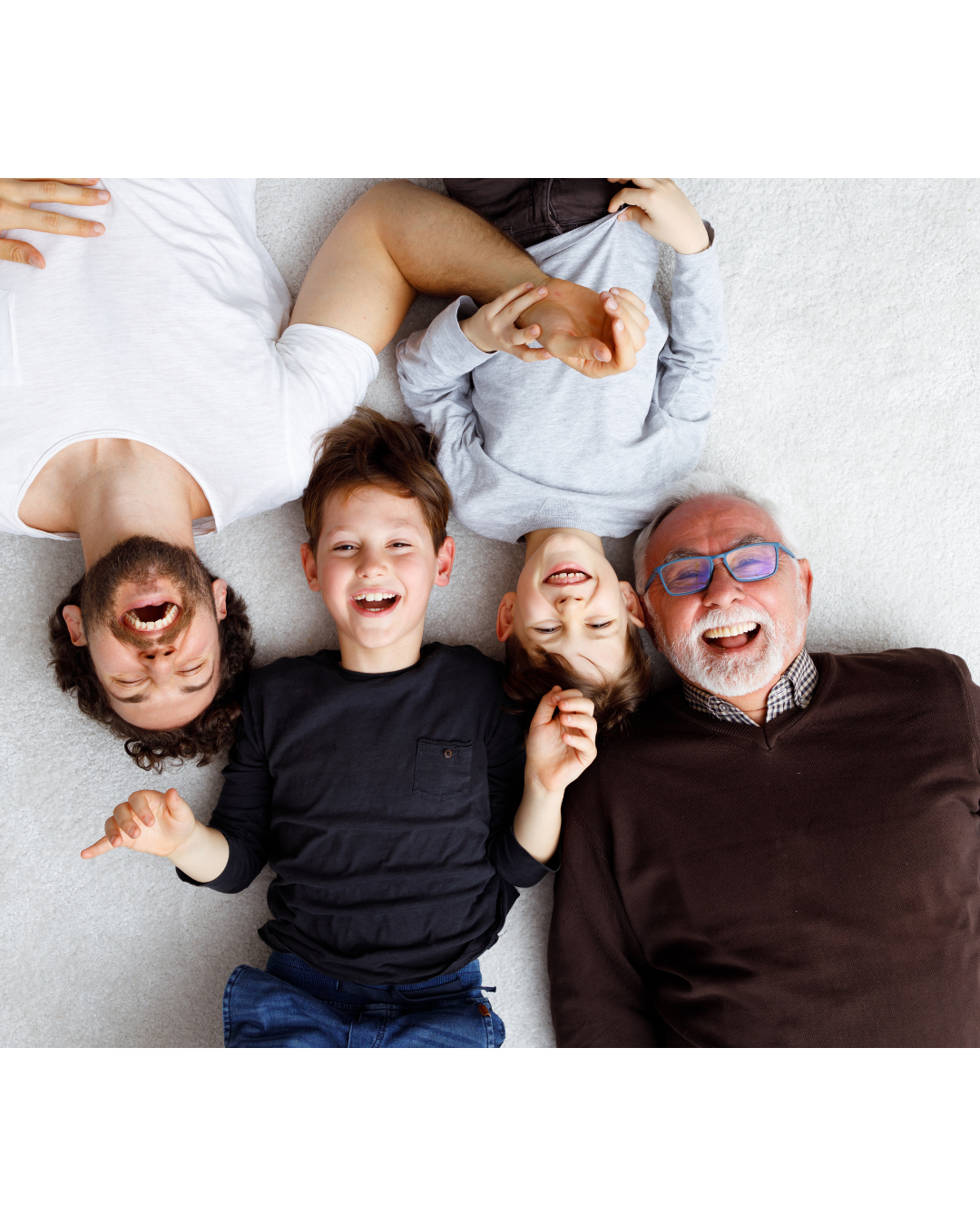 Multi-generational family laughing together — men's health acupuncture support in NW Calgary
