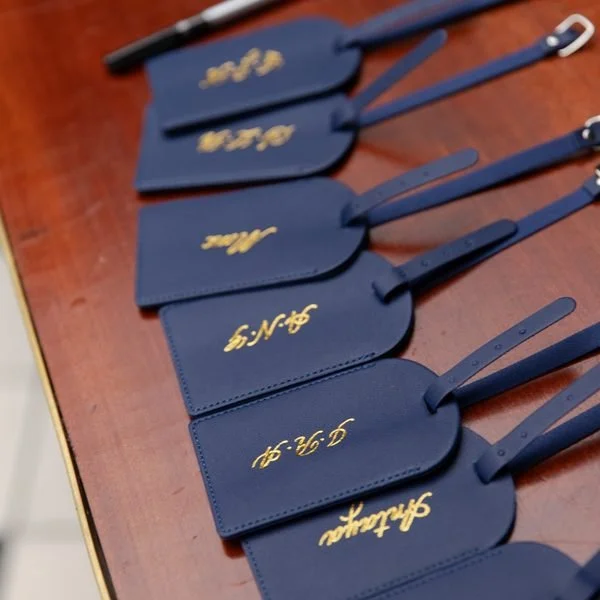 calligraphed and engraved tags