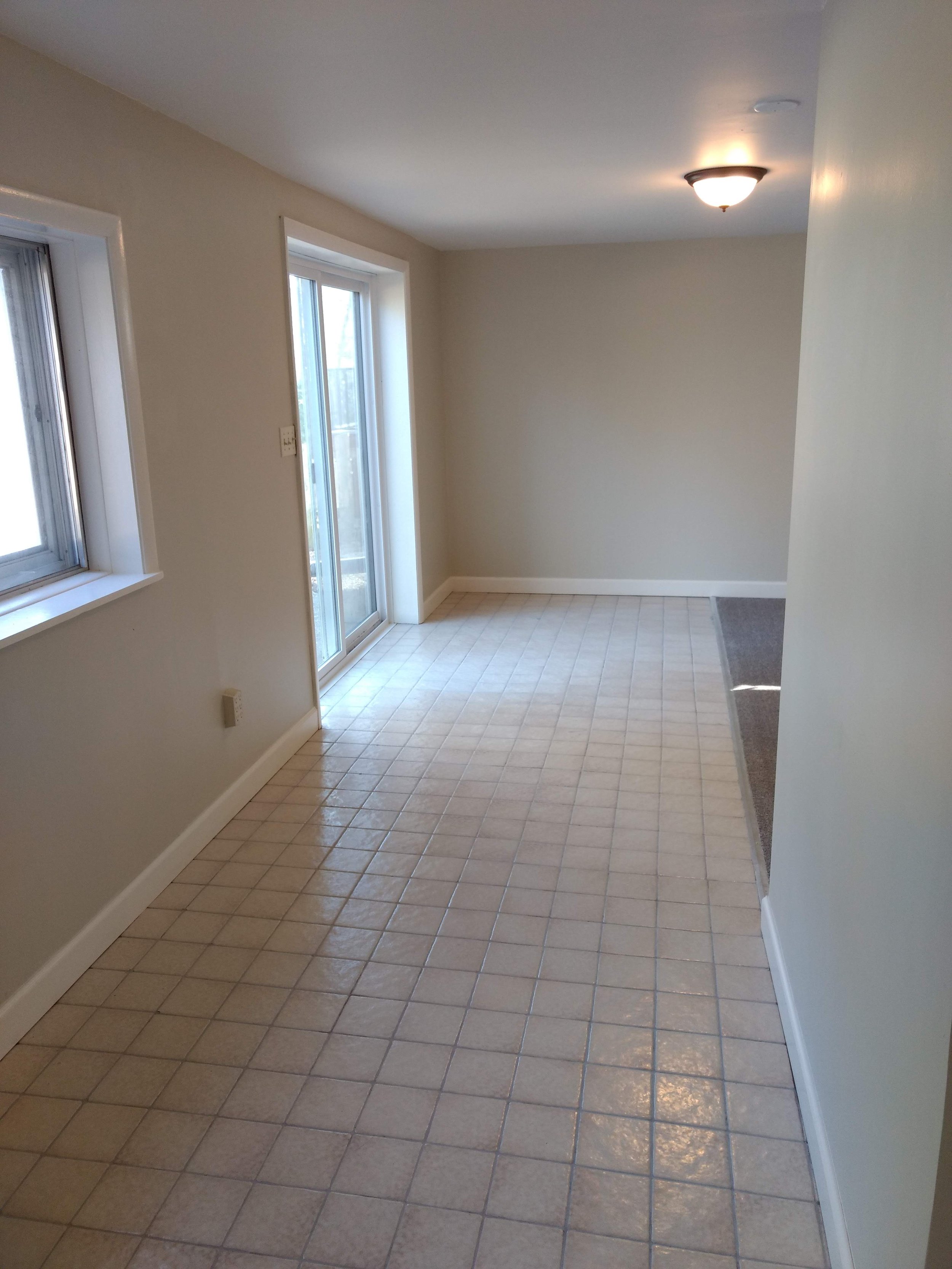 Basement entry after.  The tile was cleaned and regrouted.