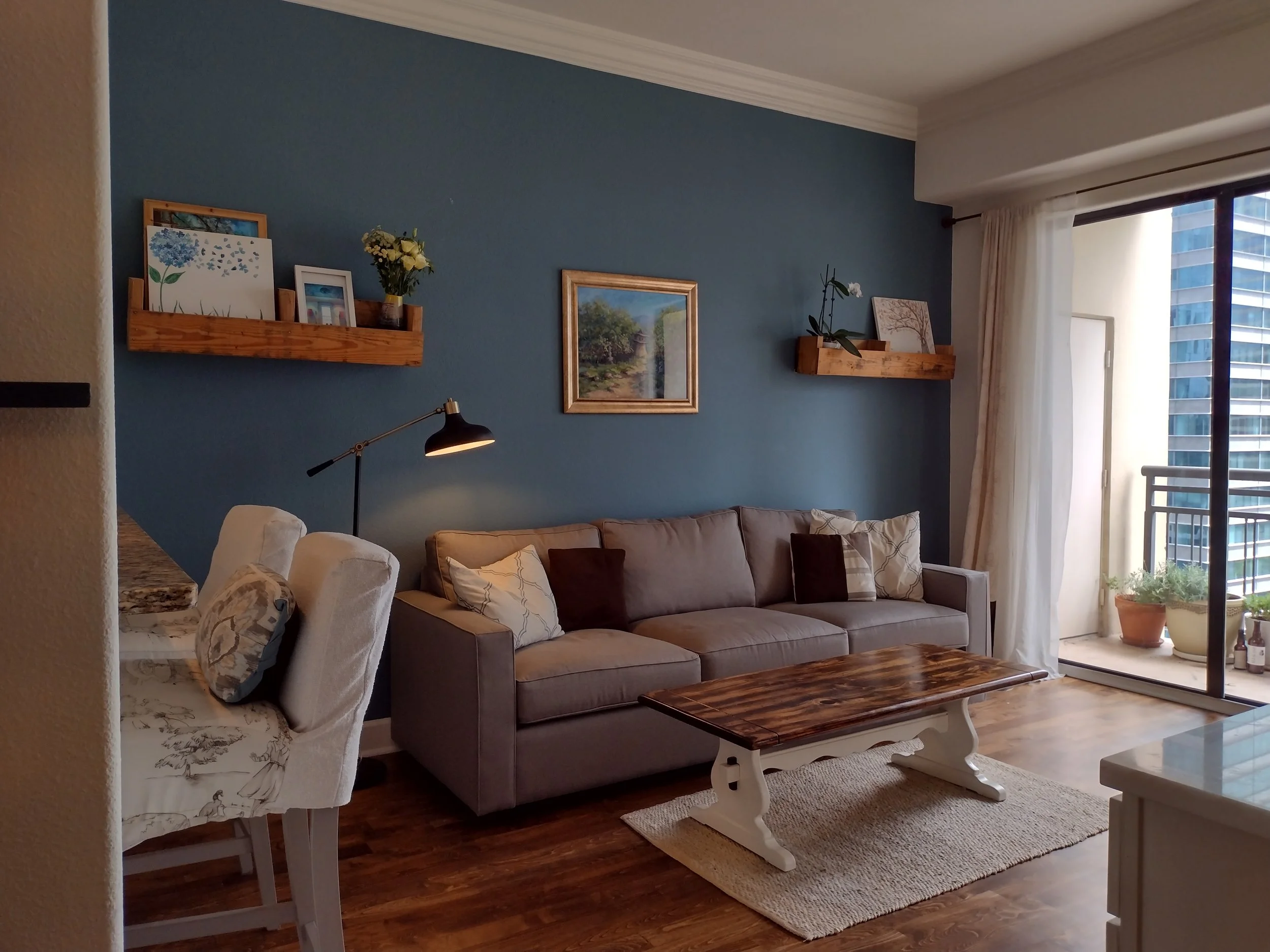 This space did not need much, the floors were refinished and we painted a feature wall.