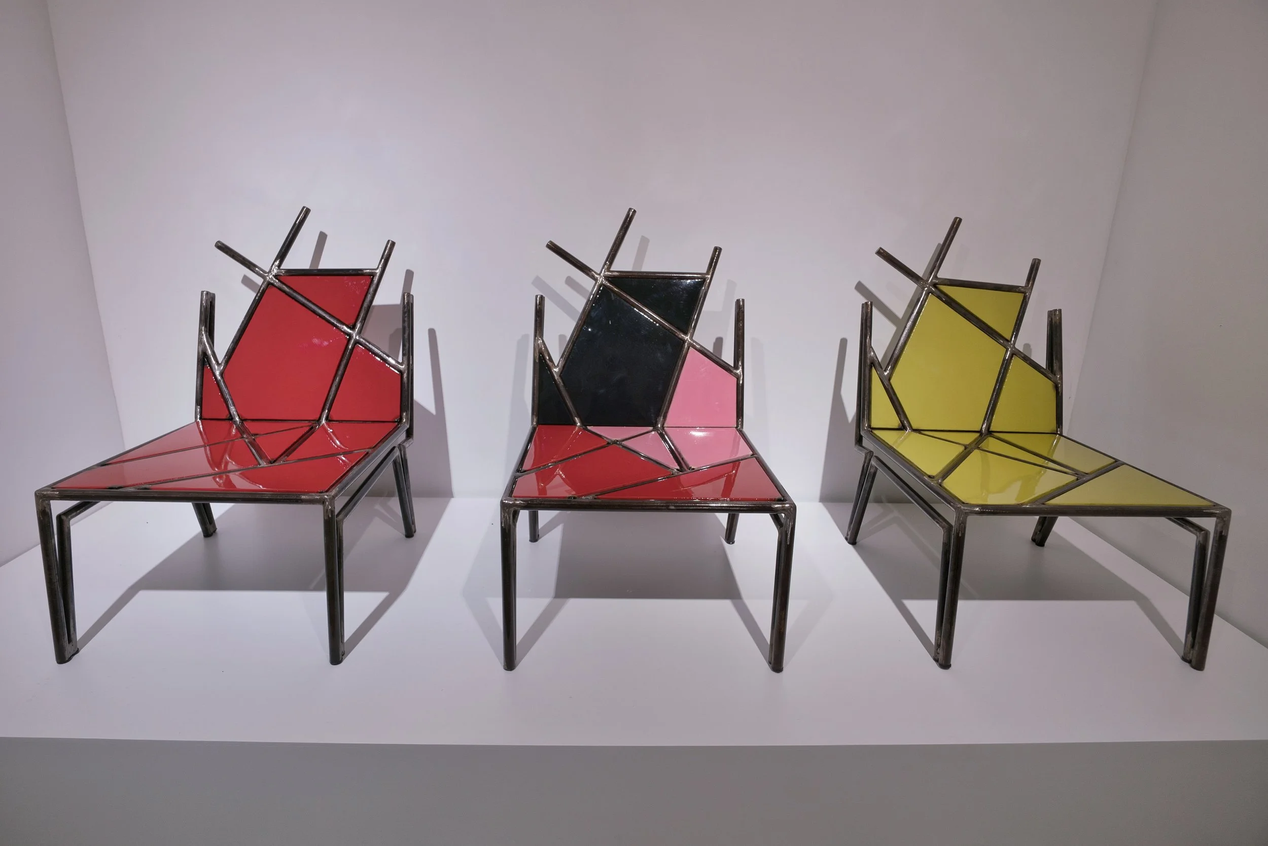 OUSMANE MBAYE - ISSA Chair - Graphic Collection - Medium: Recycled Metal (different Colors) - size Height 65 x Length 52 x Width 52cm - year 2015