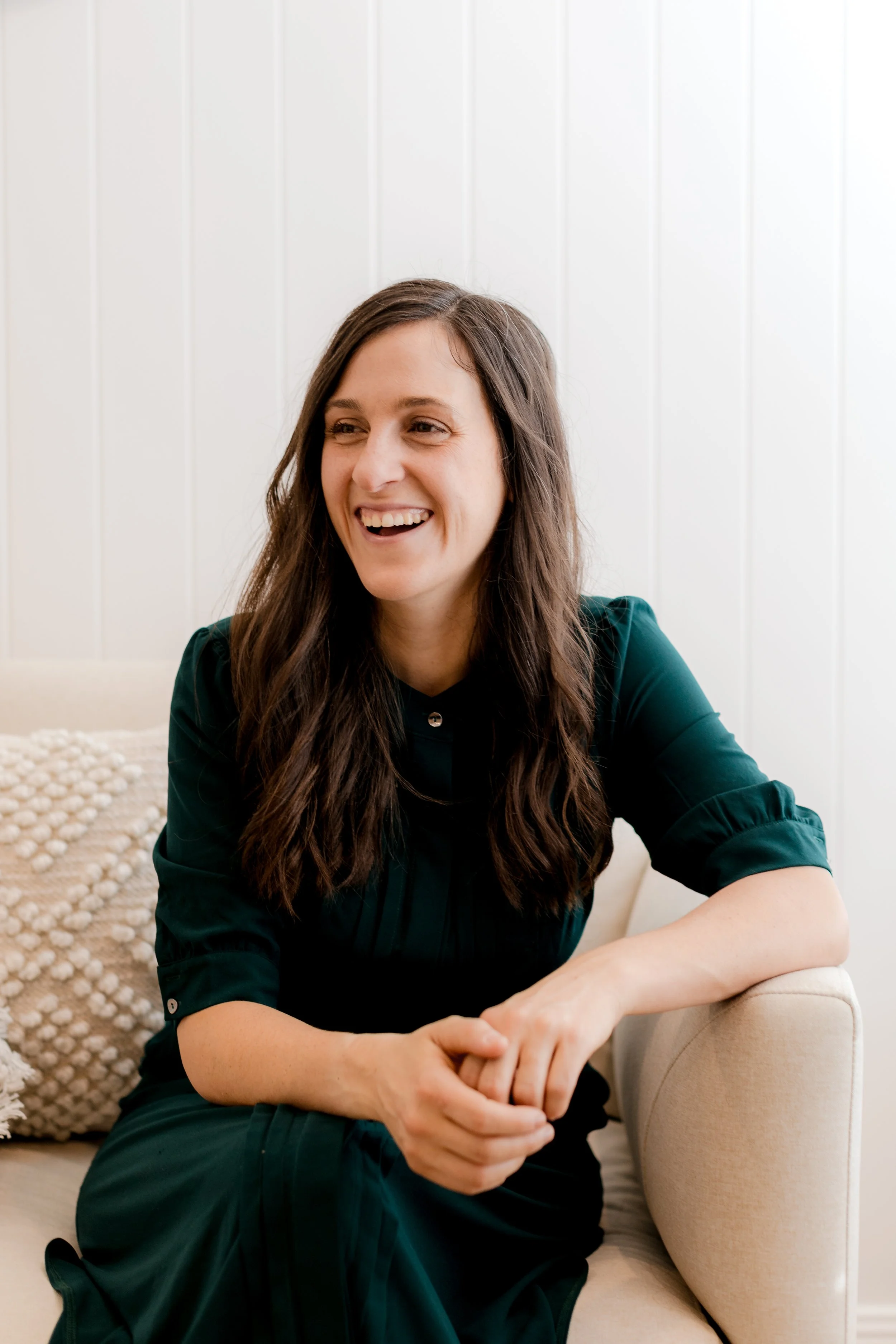 Portrait of ESDM therapist Jess Laundy supporting young children with emotional regulation, behaviour, communication, and early childhood development