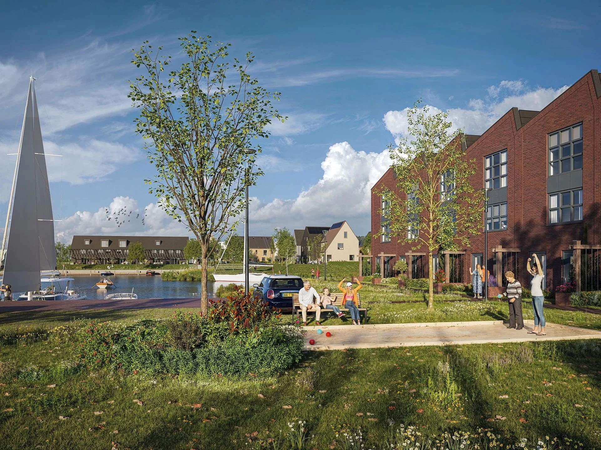 Toekomstige bewoners vieren de start van de bouw in Reeve