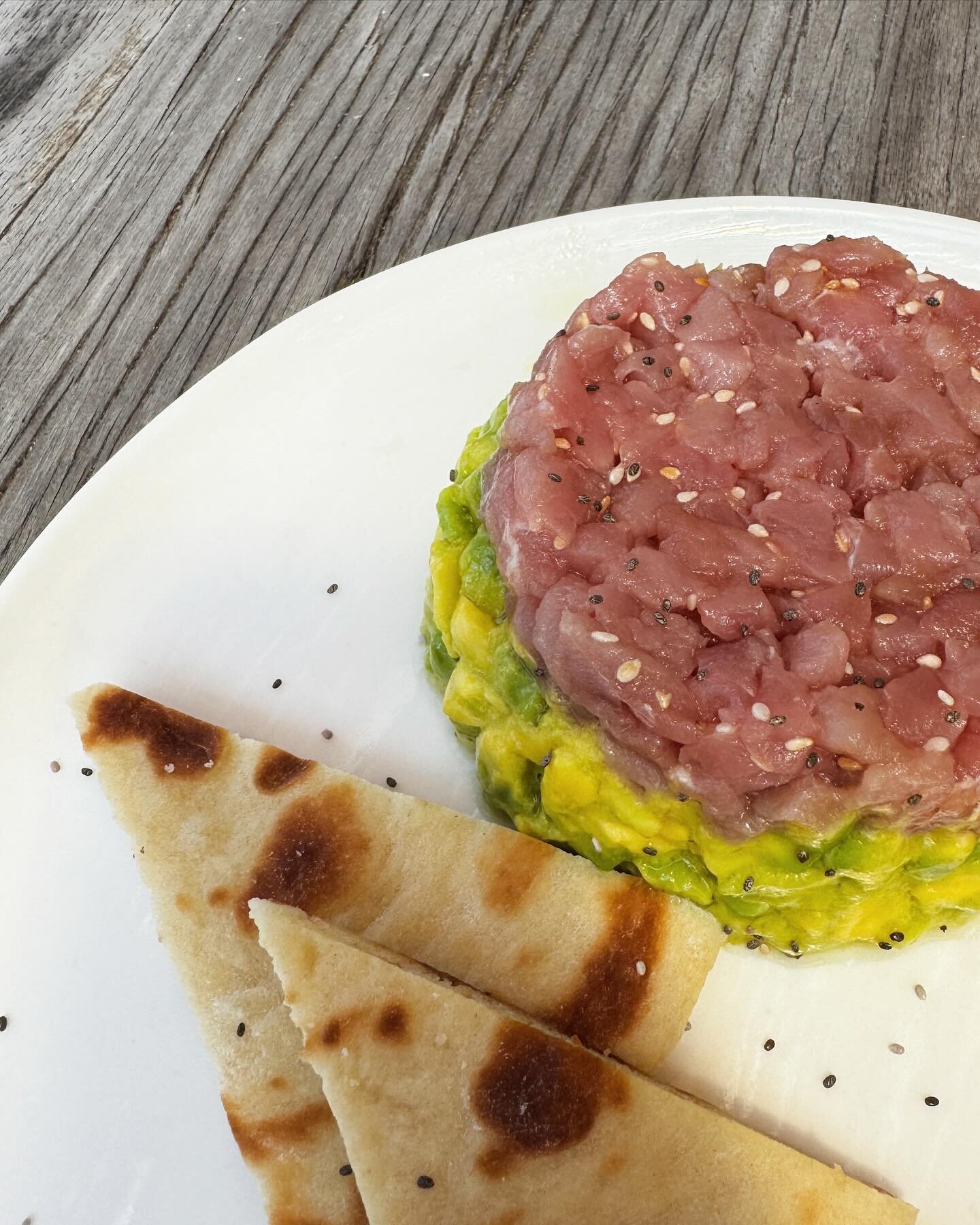 Small hunger? 

Dive into the seaside delights! 🌊

Our Tuna Tartar Avocado 🥑 is a symphony of fresh, raw tuna, creamy avocado, and a hint of zesty mango pickle. 
A burst of flavors that perfectly complements the beach vibes.

 #BeachBites #TunaTart