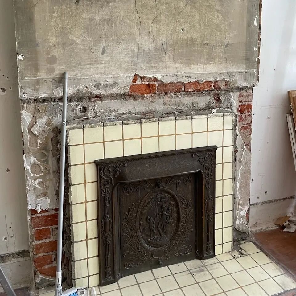 Our client had no mantle here, and since she is doing historic tax credits could not repurpose an old mantle. We built her a simple but I think pretty dang good looking piece, that covered the gaps in the tile and brick/plaster lines. #classacontract
