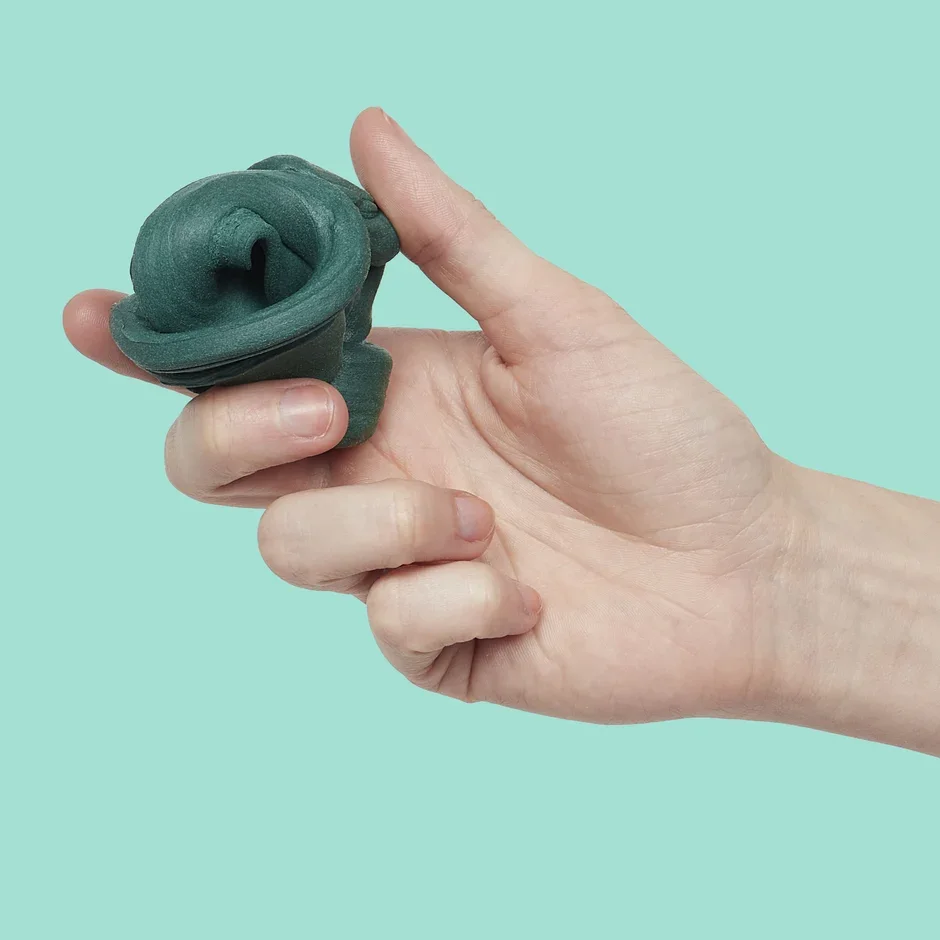 speks-blur-fidget-toy-forest-hand.webp