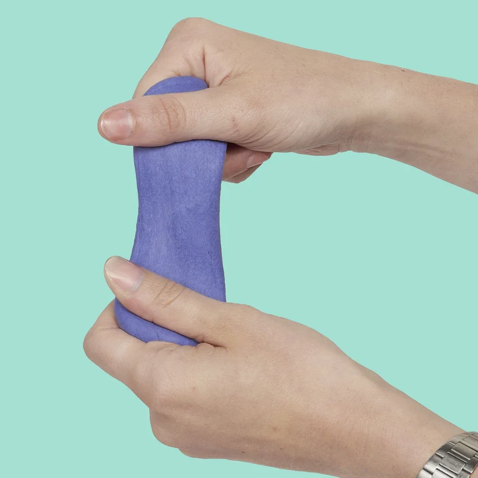 speks-blur-fidget-toy-twilight-two-hands.webp