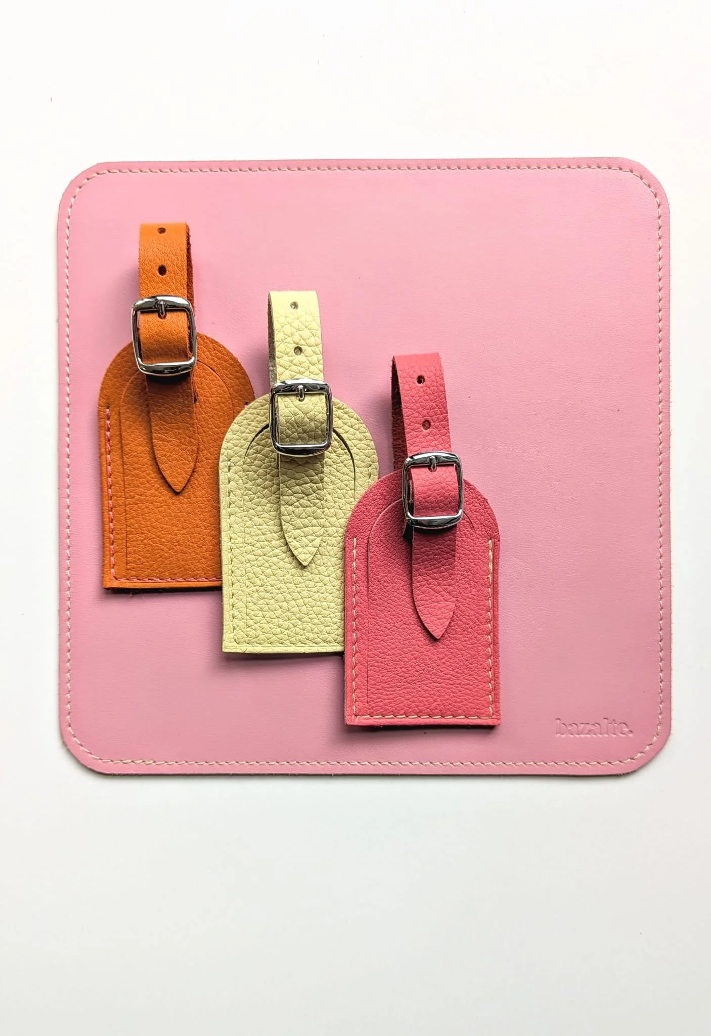 etiquette bagage en cuir rose jaune orange.jpeg