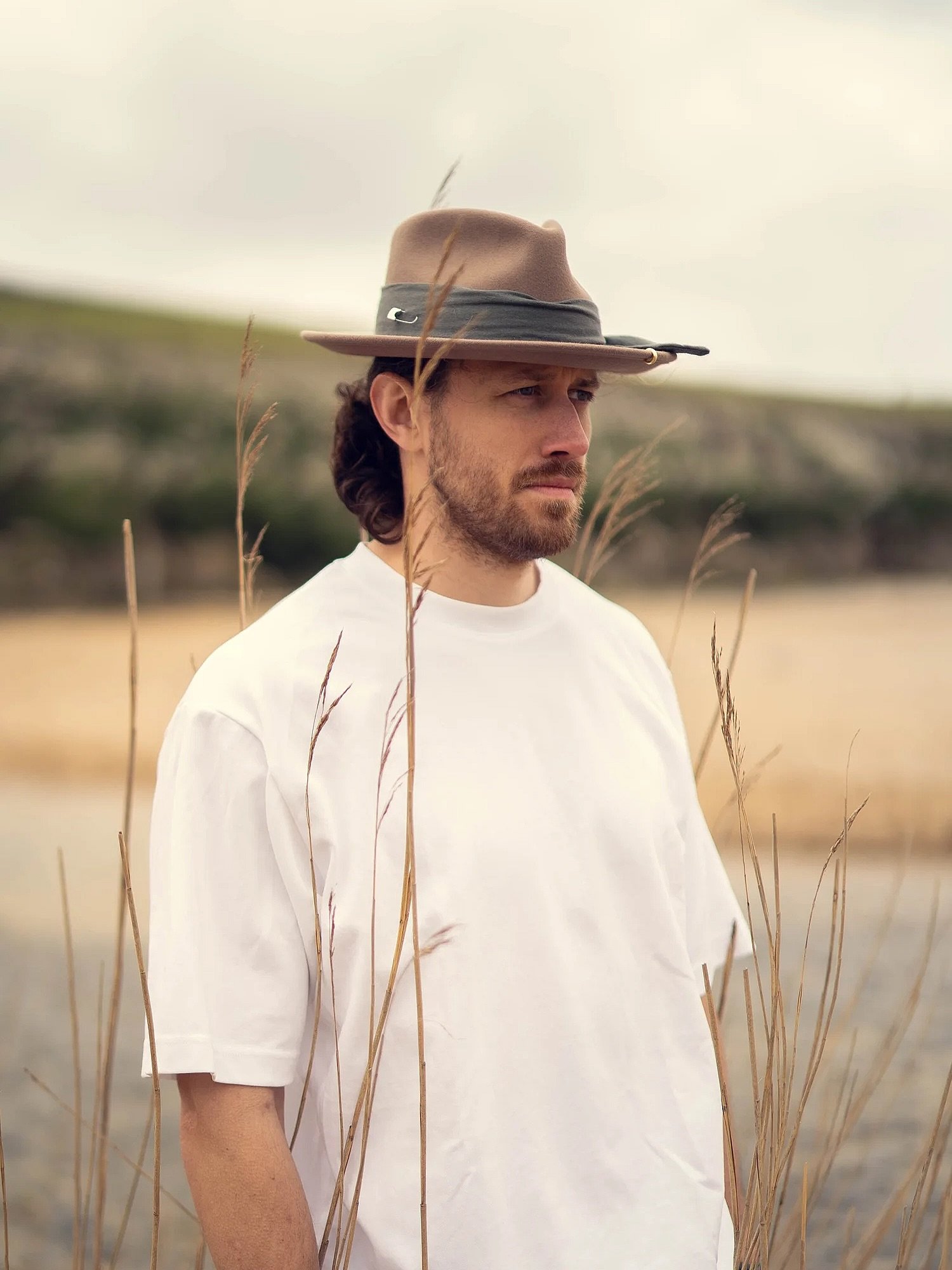 All of our styles are unisex and made for everyone to enjoy! Our model James wears his Mylor Trilby with its chunky &lsquo;curve&rsquo; charm, available on the jewelled version (tagged here to shop).
This style is universal and perfect for all! But a