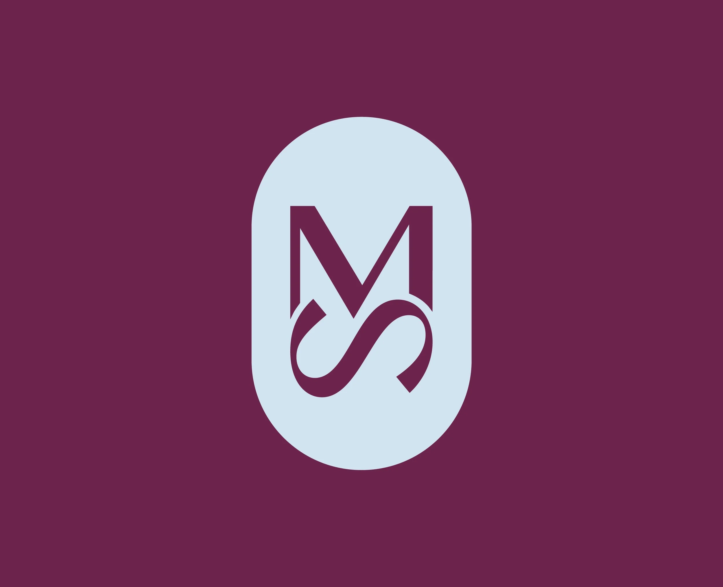 A white circle with a maroon letter "M" and a maroon fox logo on a dark purple background.