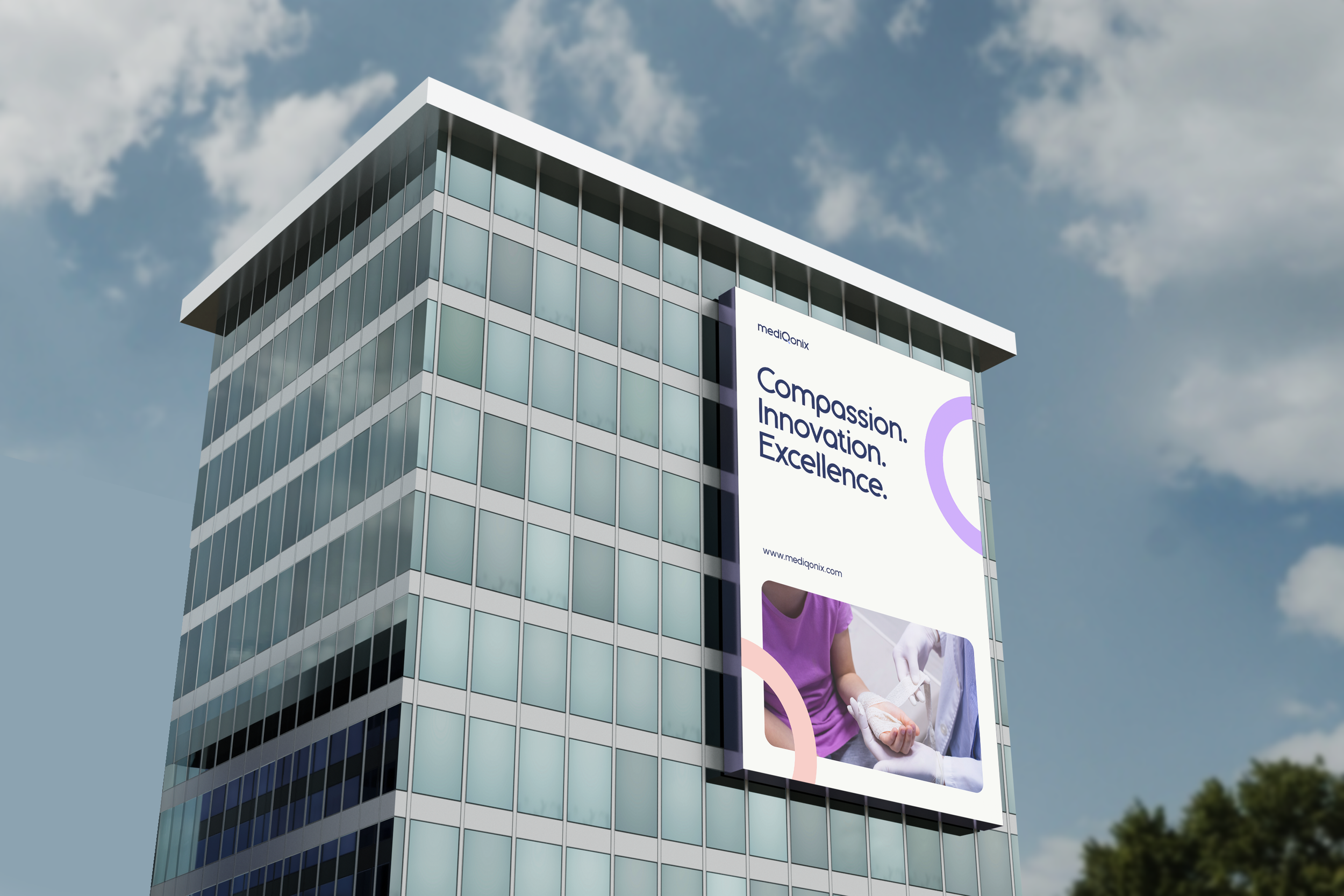 Modern office building with glass windows and a large billboard displaying the words 'Compassion. Innovation. Excellence.' along with a website address and images of people working.