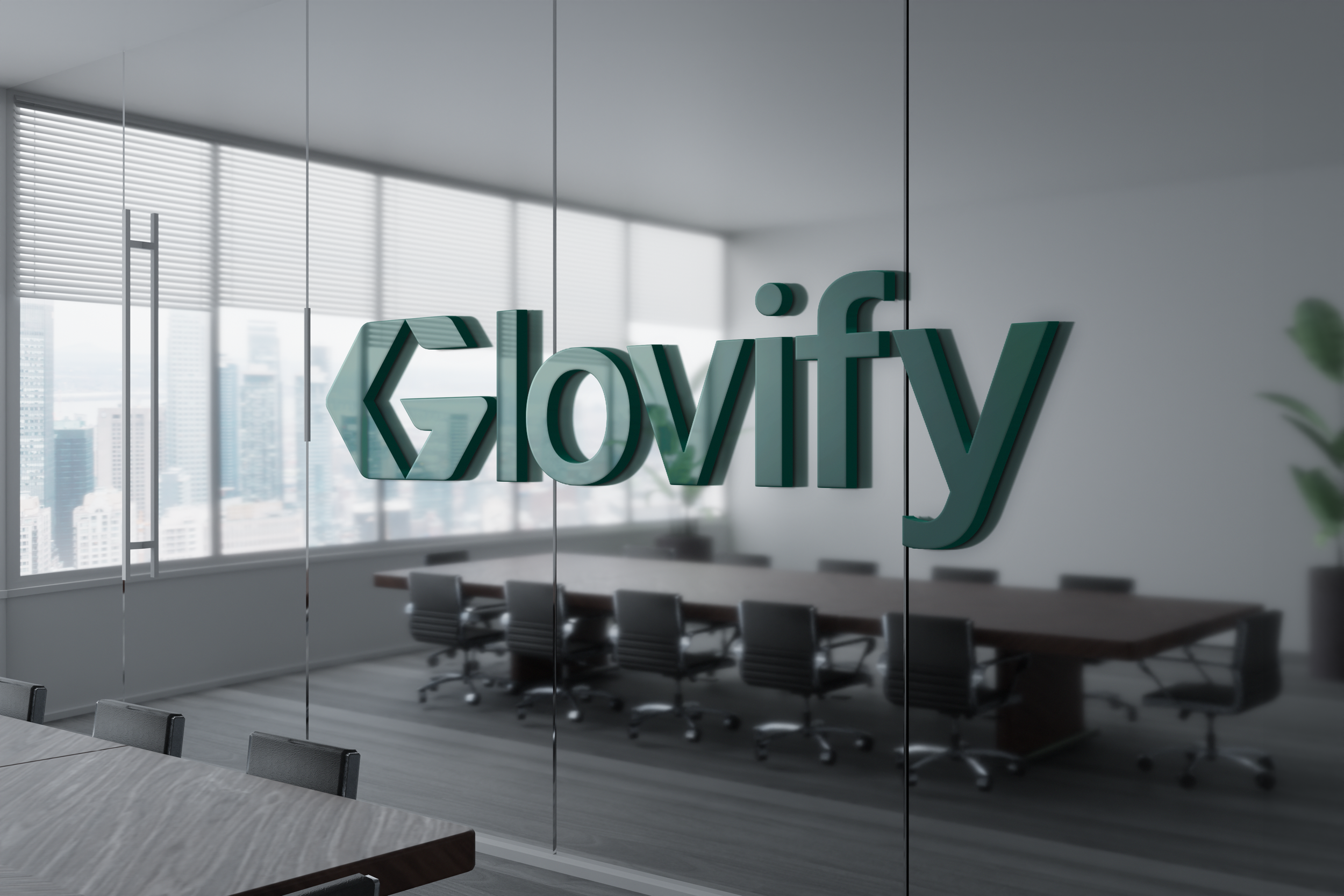 Modern conference room with a large window, a long table with chairs, and a glass wall featuring a 3D sign that says 'Aloft' and includes a stylized 'L' with an arrow pointing left.