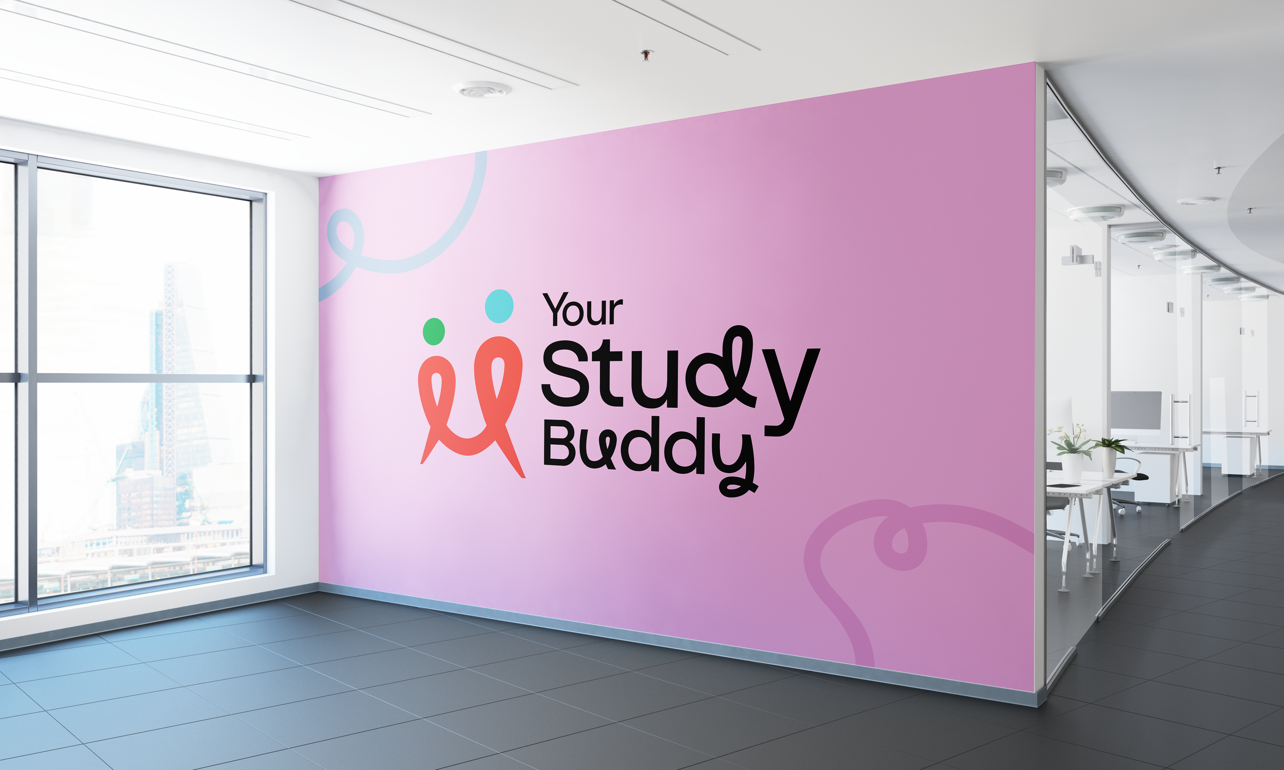 Interior of an office with a large window showing city buildings, a pink wall with a colorful logo and text 'Your Study Buddy', and a curved reception desk area with white chairs and plants.