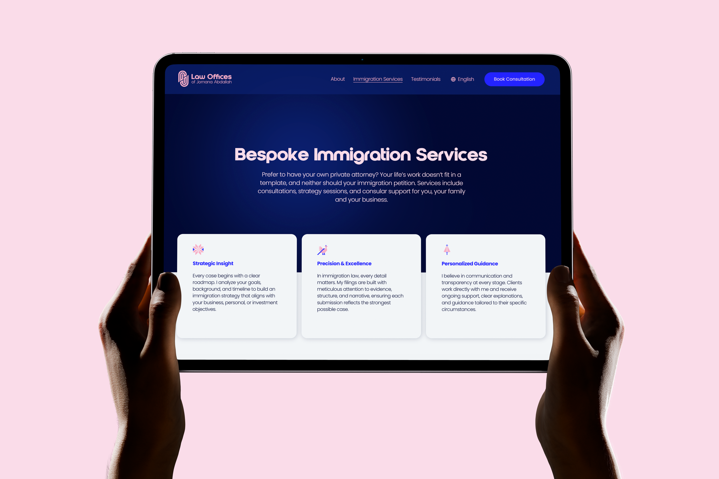 Hands holding a tablet displaying a website for legal and immigration services with a blue background and white text.