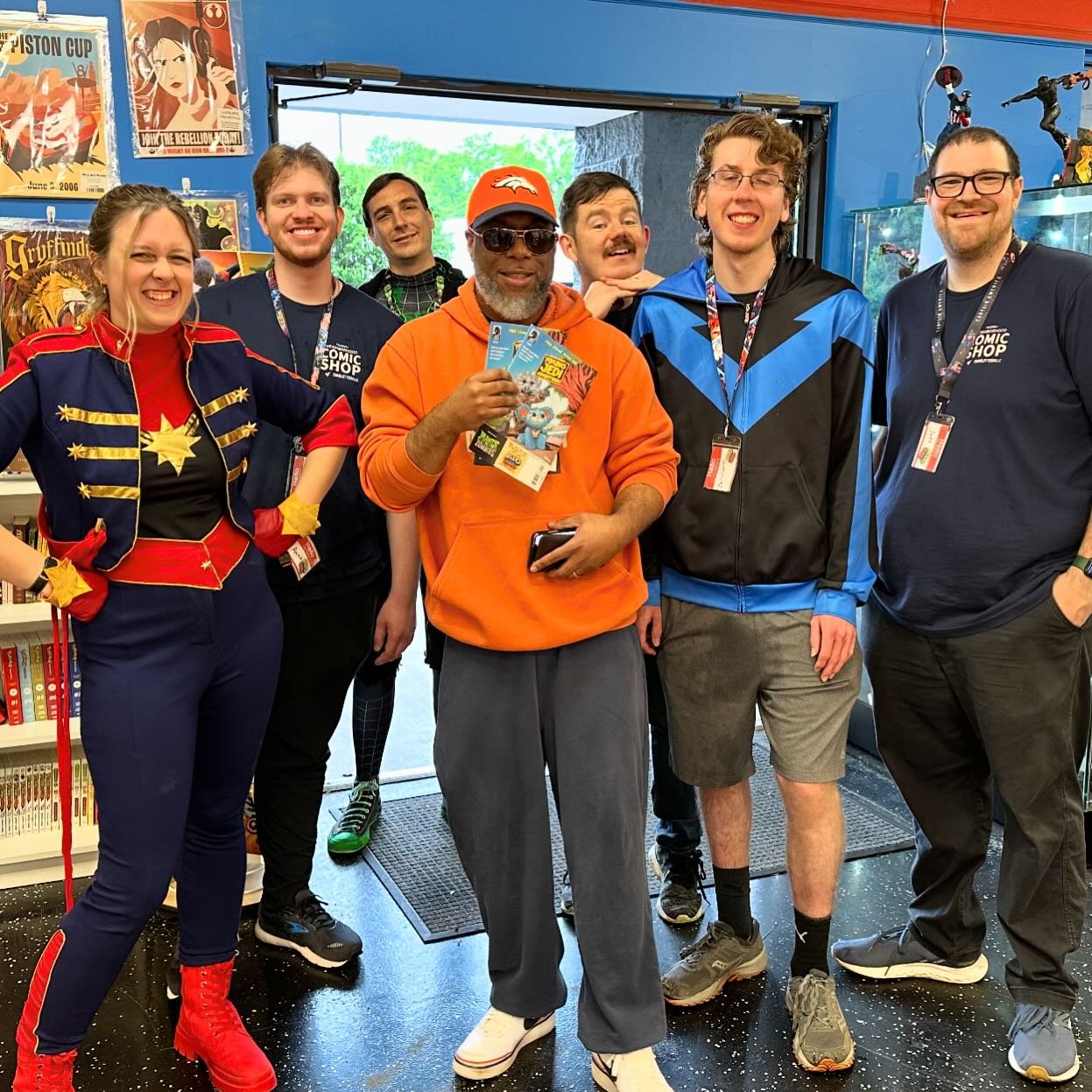What a great Free Comic Book Day! We were all too busy to take pictures (and we had professional videographers in the shop for Reasons), but had to say yes when our friend Gary asked us for a pic! Unfortunately Kate had already left to pick up the ki