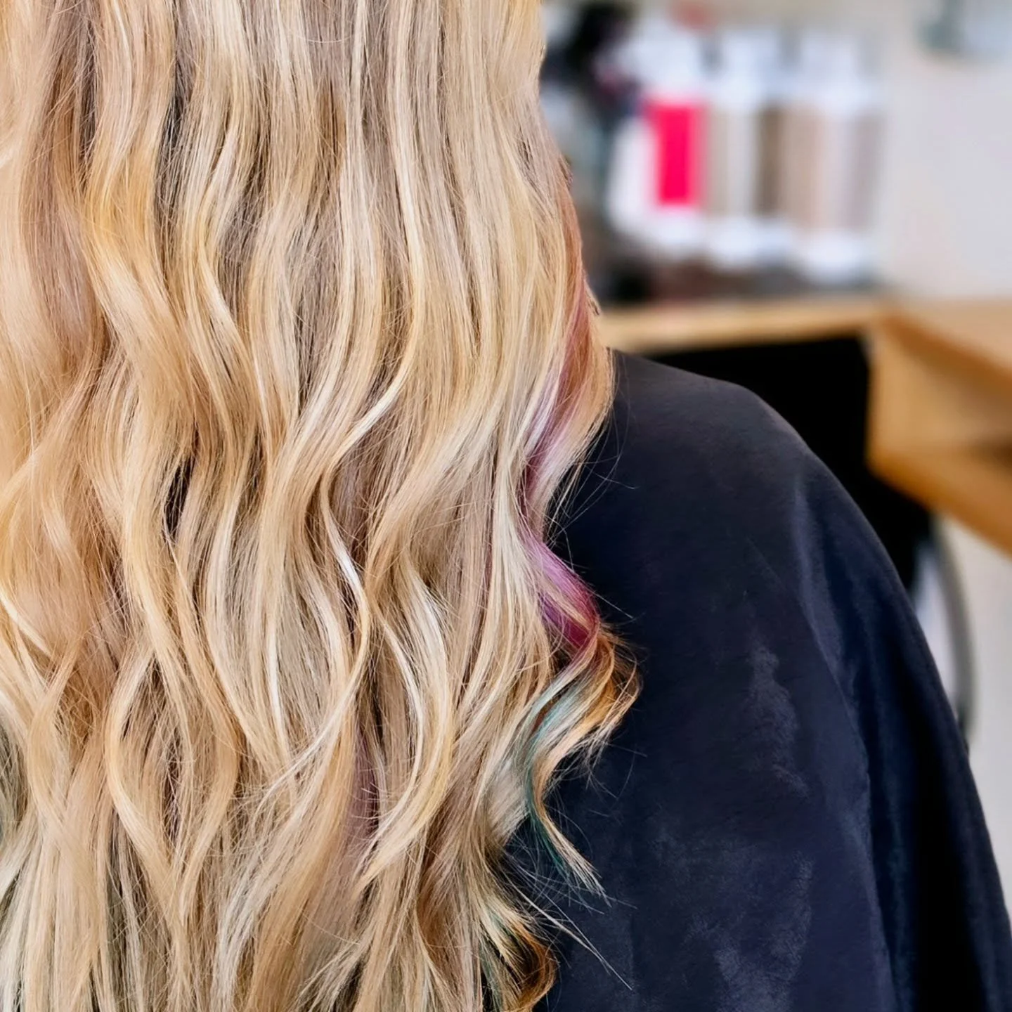We had a little fun adding this peak a boo color on this summer blonde