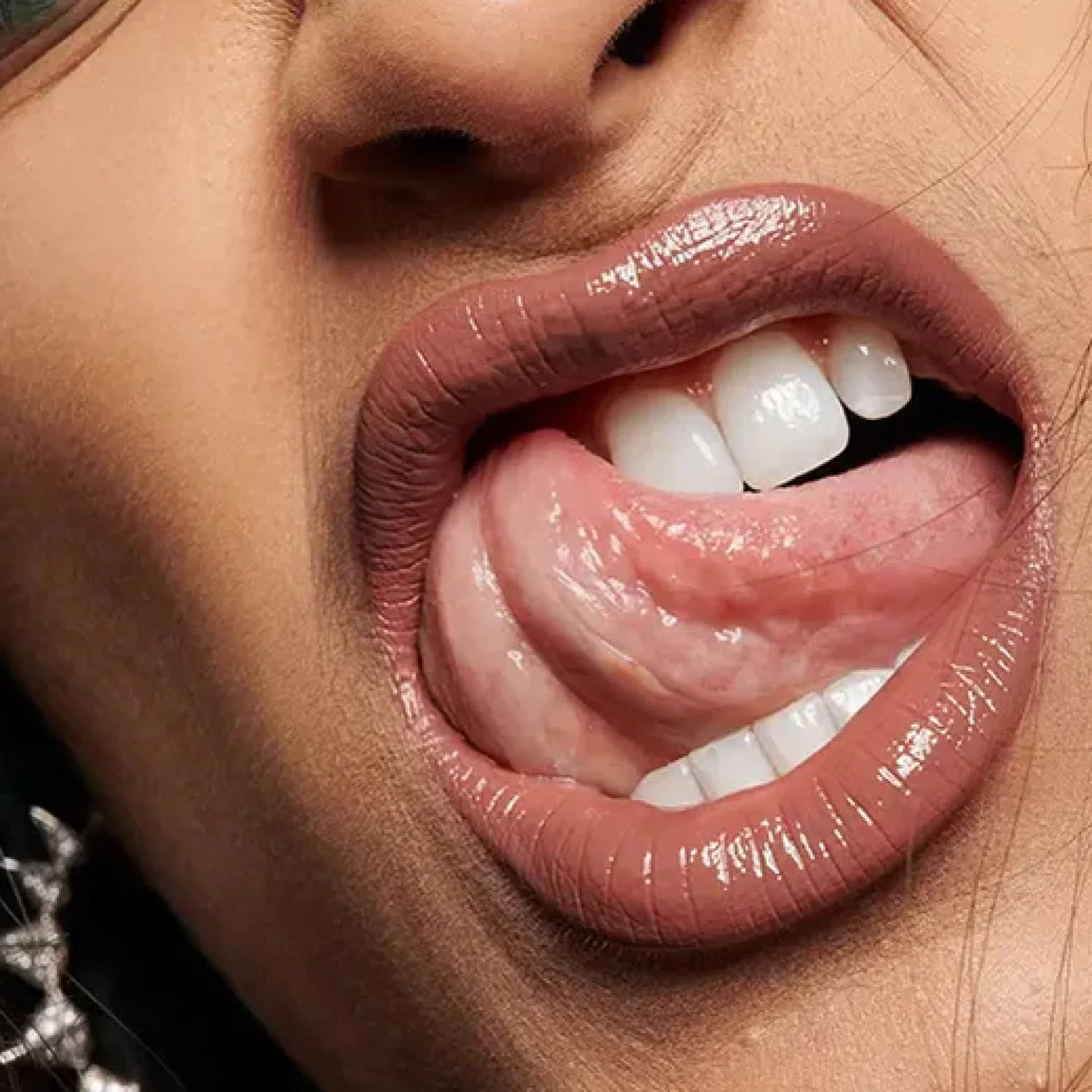 About Face-Light Lock Lip Gloss-Famm.jpg