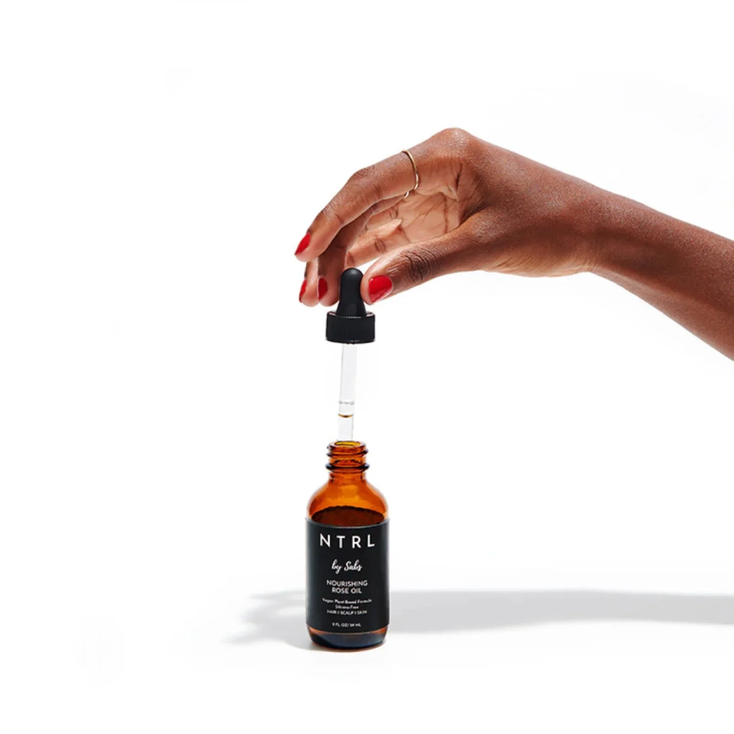 NTRL-Nourishing Rose Oil-Famm.jpg