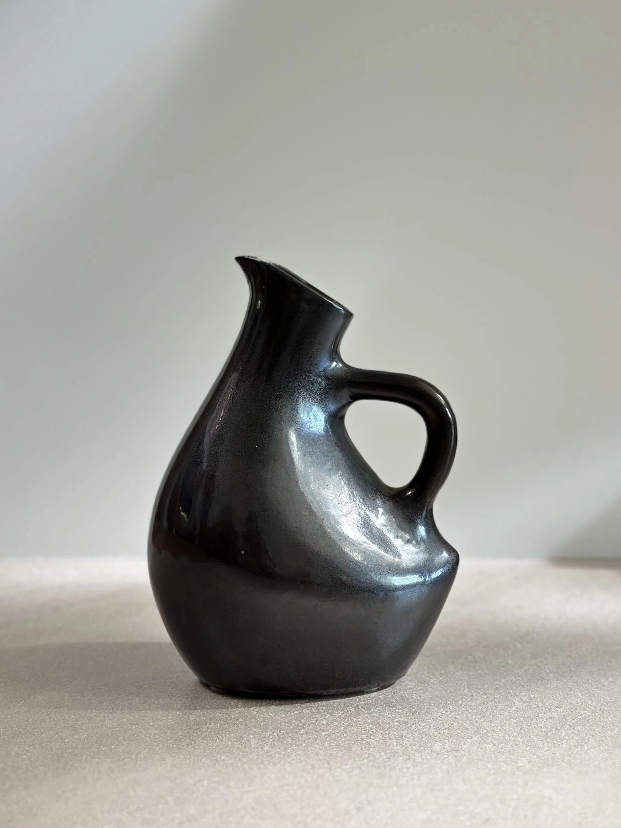 A Black Glazed Ceramic Pitcher by Jacques & Dani Ruelland, Signed, France, 1960s