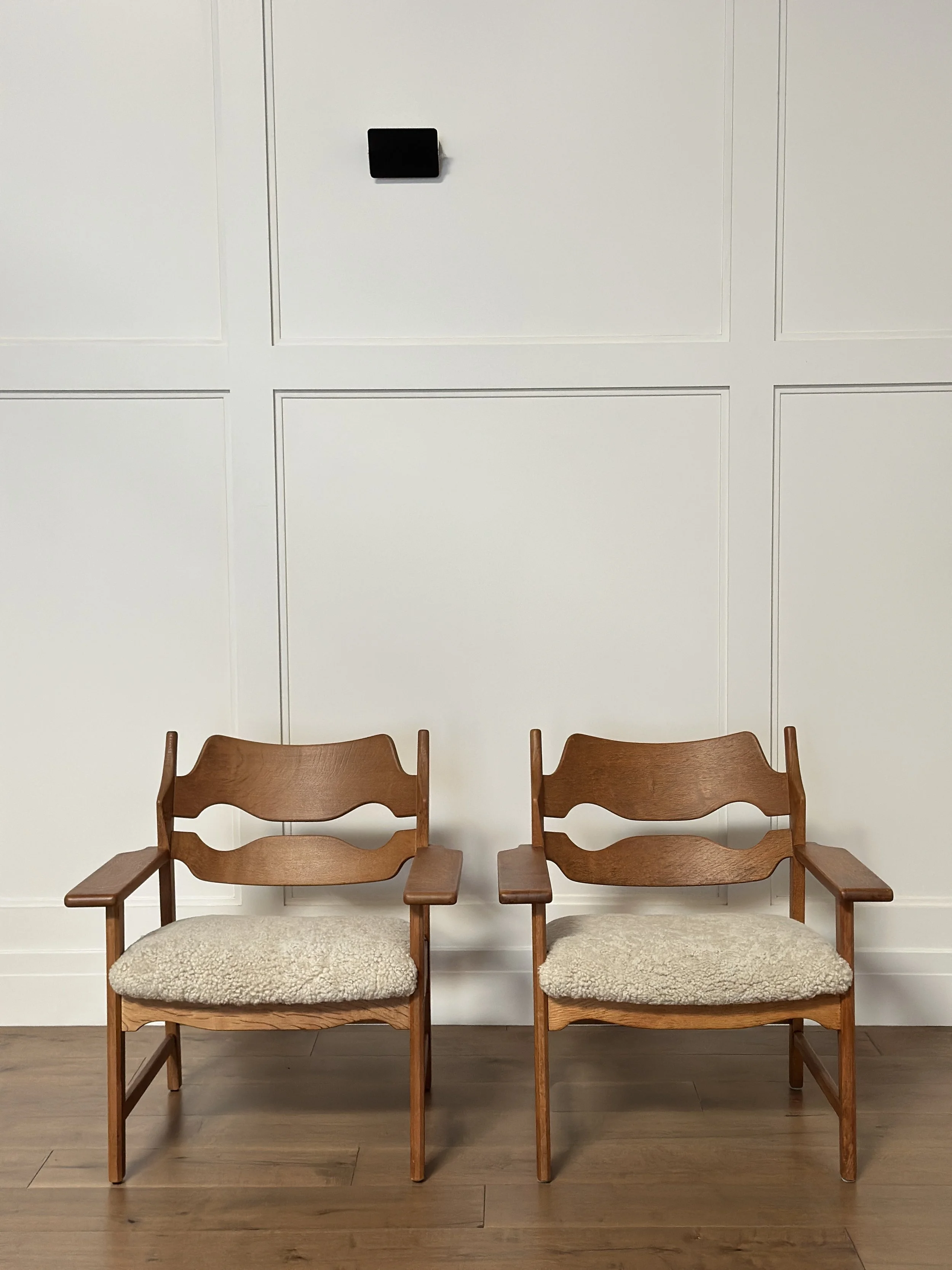 Pair of Oak and Shearling Chairs by Henning Kjærnulf, Denmark 1950s