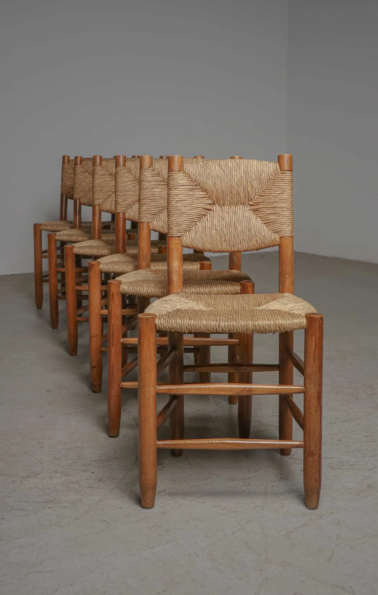 Set of Six Bauche Chairs by Charlotte Perriand, BCB Edition in all Original Straw COMING SOON