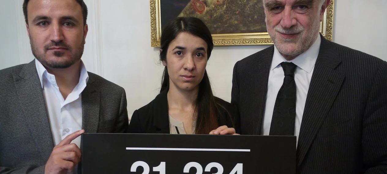 Nadia Murad hands over the Global Citizen petition to the Iraqi Embassy in London