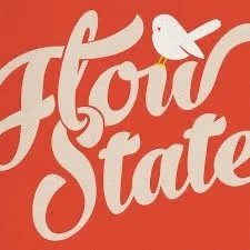Logo with the text 'flour state' in white cursive font on a red background, featuring a small bird icon.