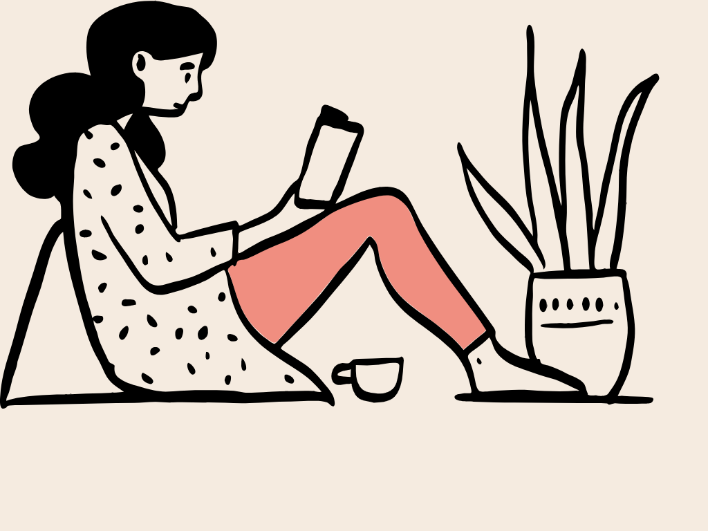A girl with black hair, wearing a polka dot shirt and coral-colored pants, sitting on the floor, looking at her phone, with a small cup and a potted plant nearby.