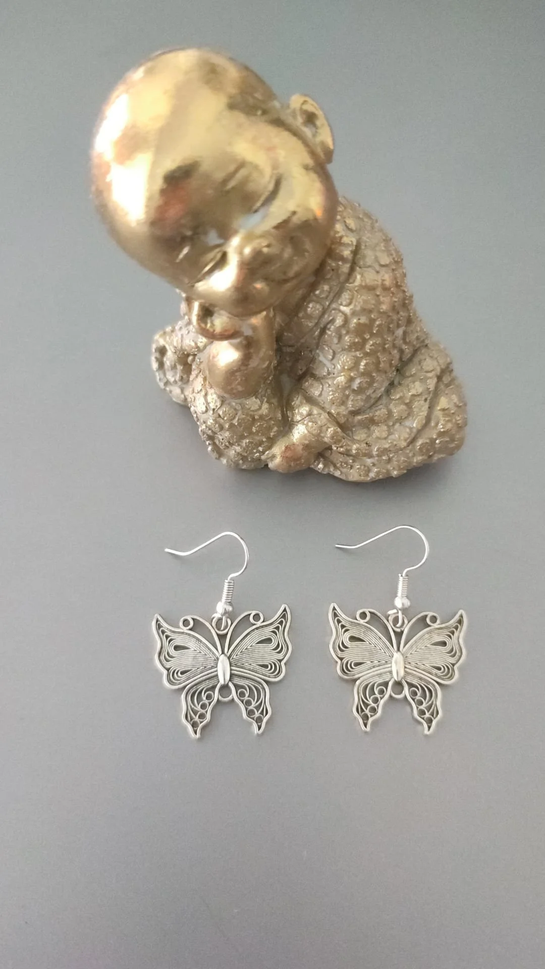Boucle d'oreille papillon