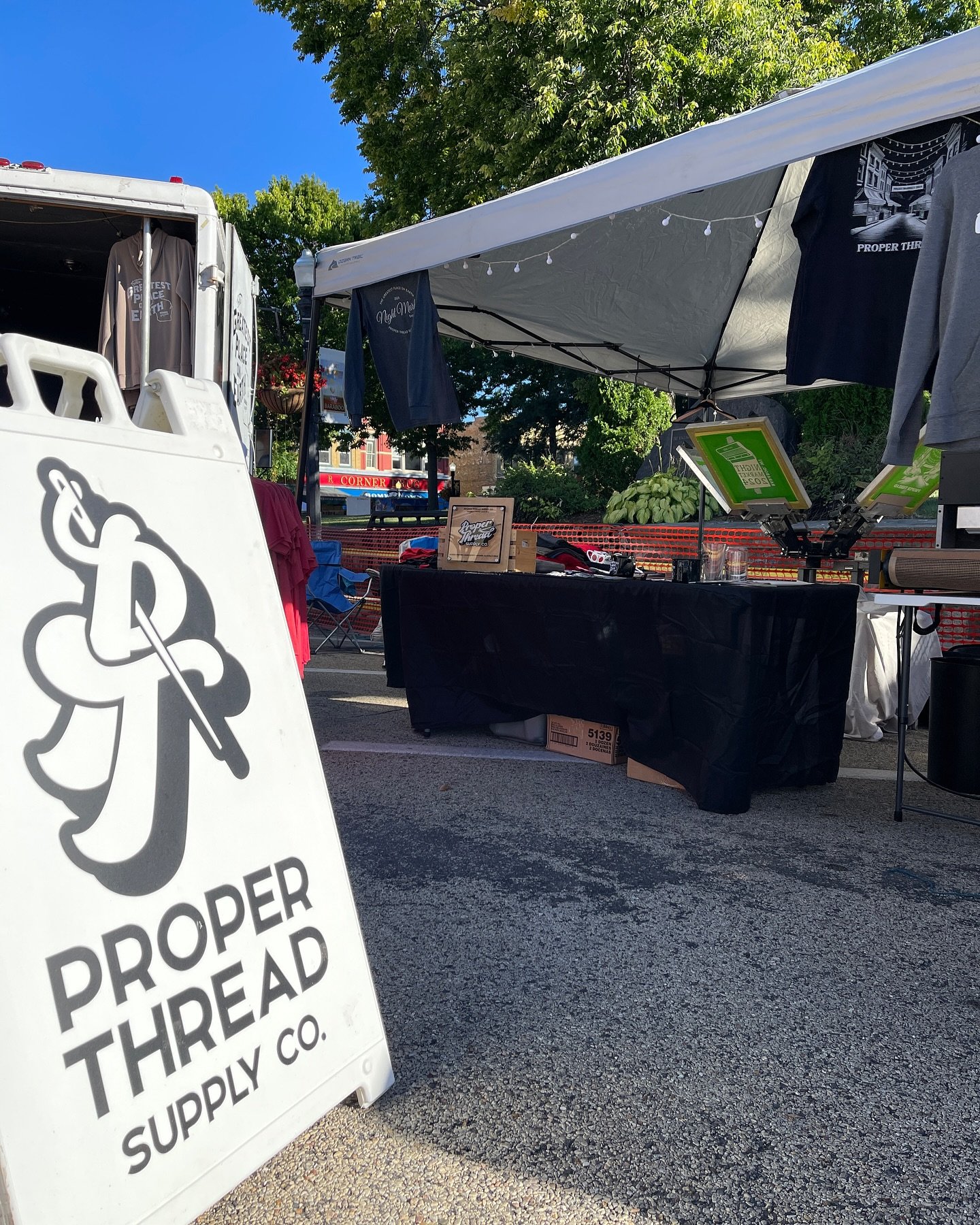 See you tomorrow at @downtownbaraboo Fall Fair on the Square! We will be located next to @thegreatestplaceonearthbrand with more custom designs ready to add to the back of the garments! Can&rsquo;t wait to see you! #liveprinting #screenprinting #gpoe