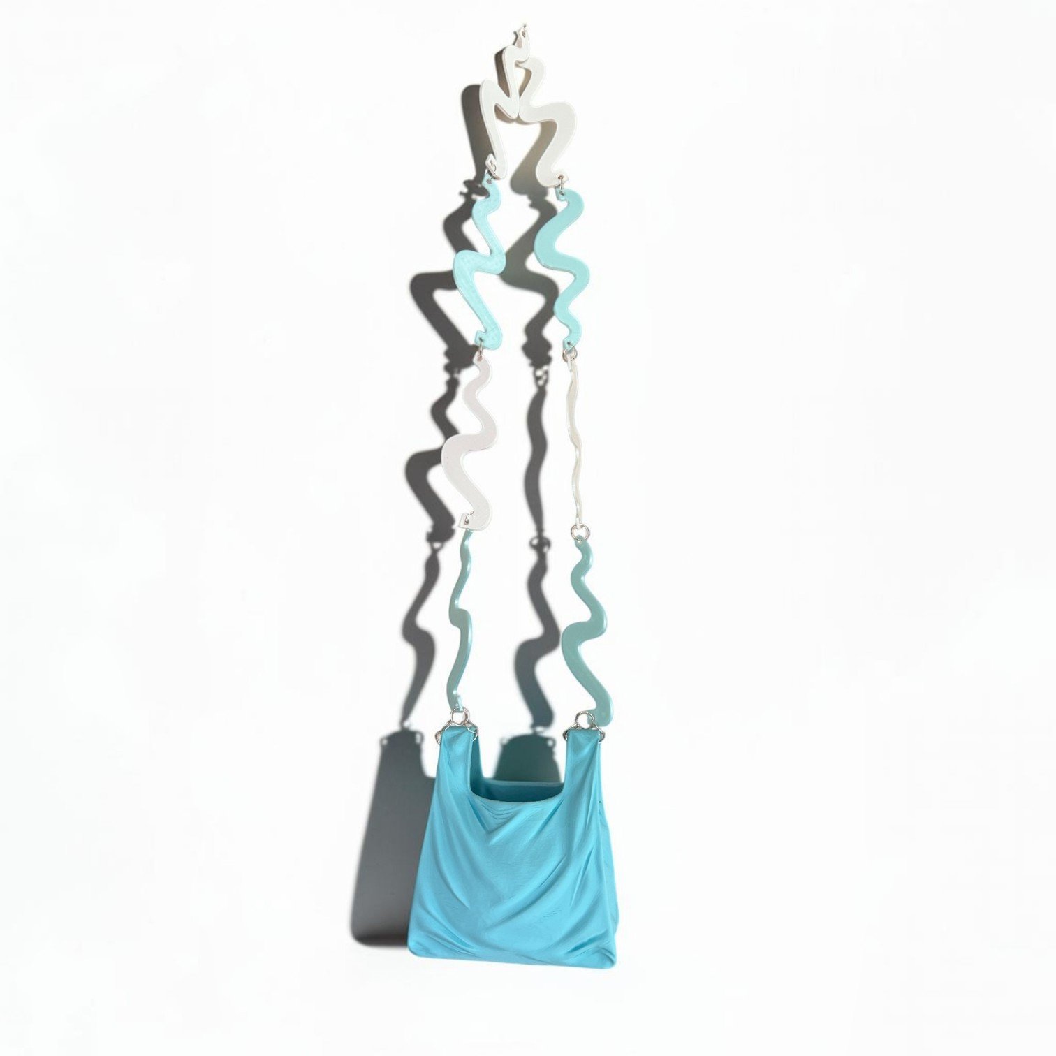 The BAE-G  Solid body purse in Baby Blue
