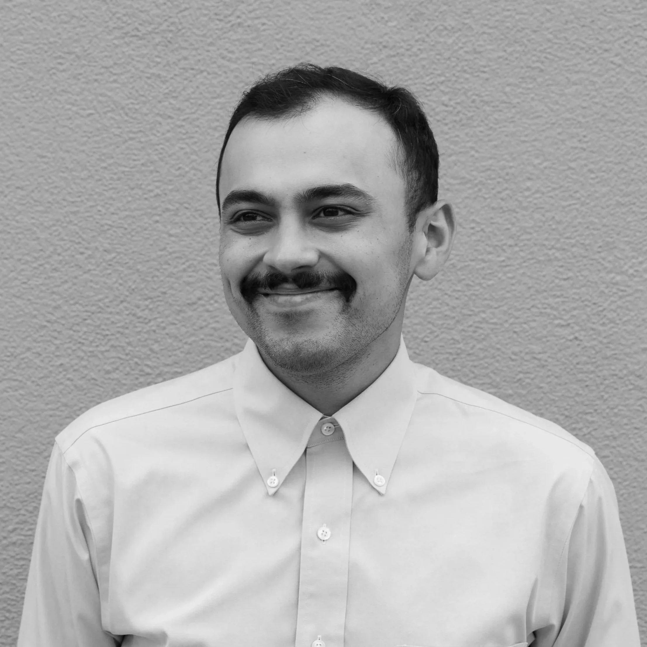 Portrait of a smiling Marketing Manager at Design Draw Build Architects and Builders in San Francisco Bay Area.