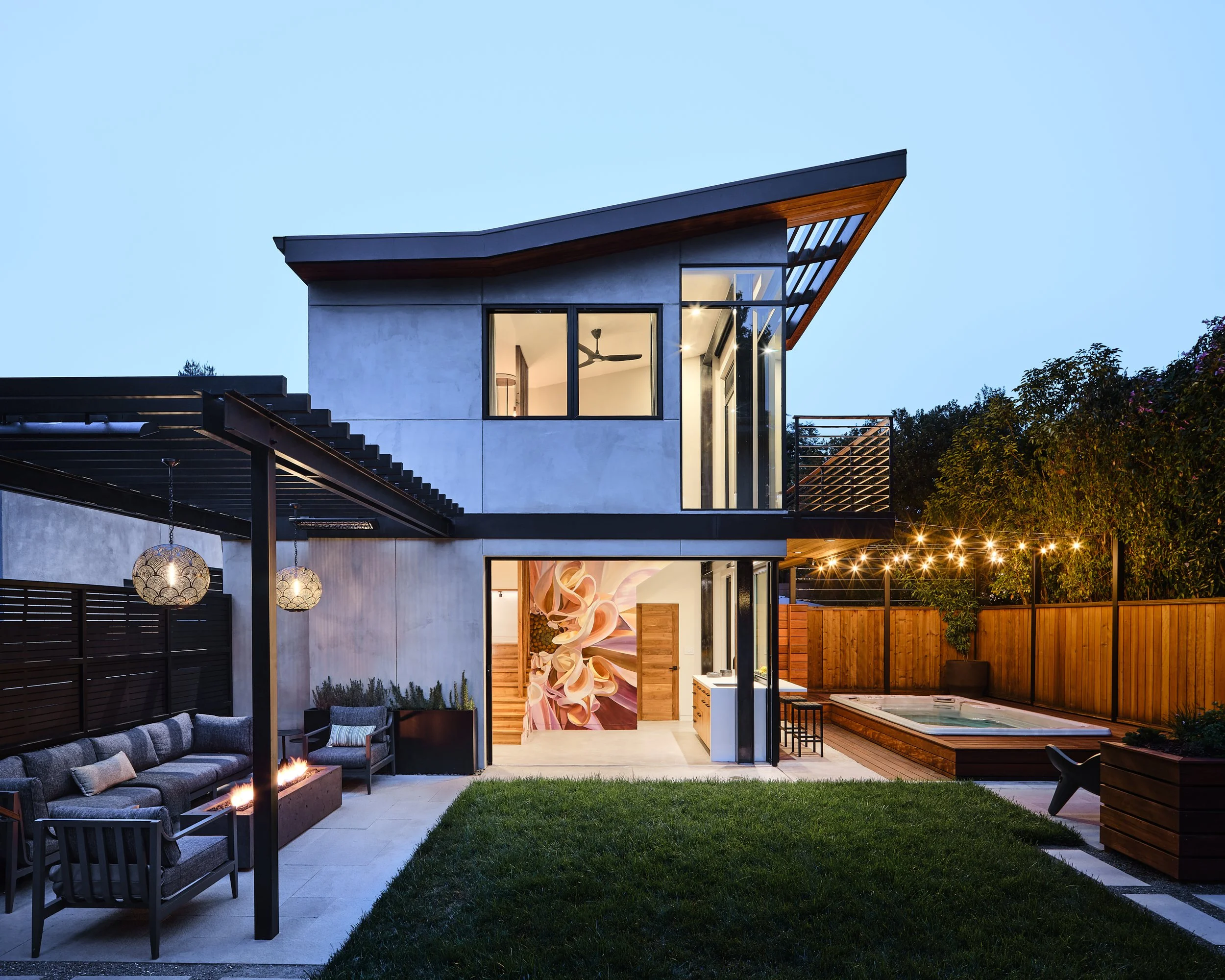 Set in the backyard of a family home on a residential street in Oakland, California, Kinetic Pavilion transforms a constrained backyard into a layered sequence of indoor and outdoor spaces. The two-story ADU occupies the footprint of a pre-existing b