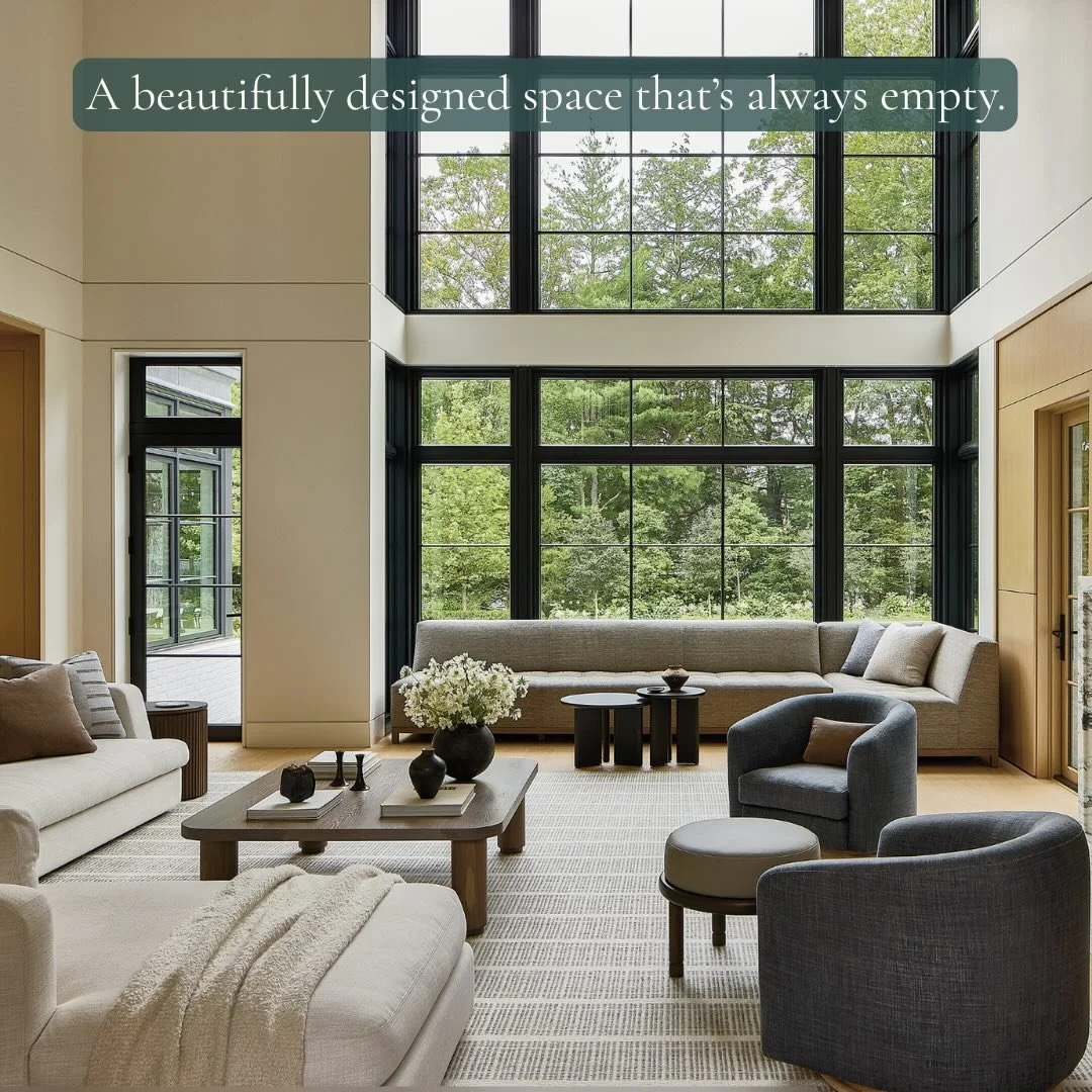 Large living room with floor-to-ceiling windows and open layout creating fast-moving, ungrounded energy