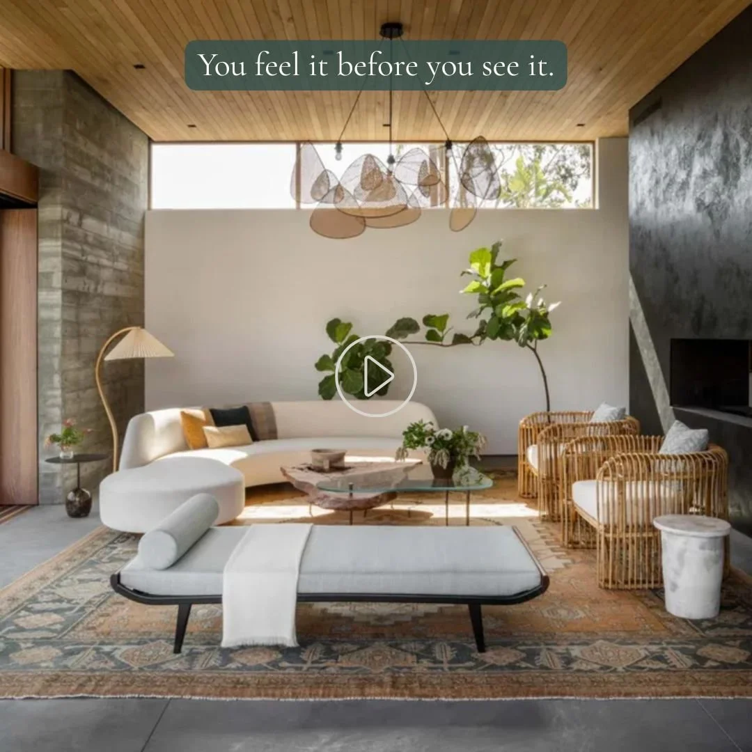 Living room with curved seating, natural textures, and balanced layout supporting comfort and energy flow.