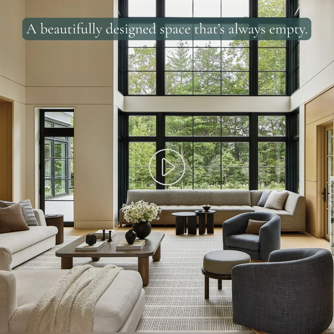 Large living room with floor-to-ceiling windows and open layout creating fast-moving, ungrounded energy.
