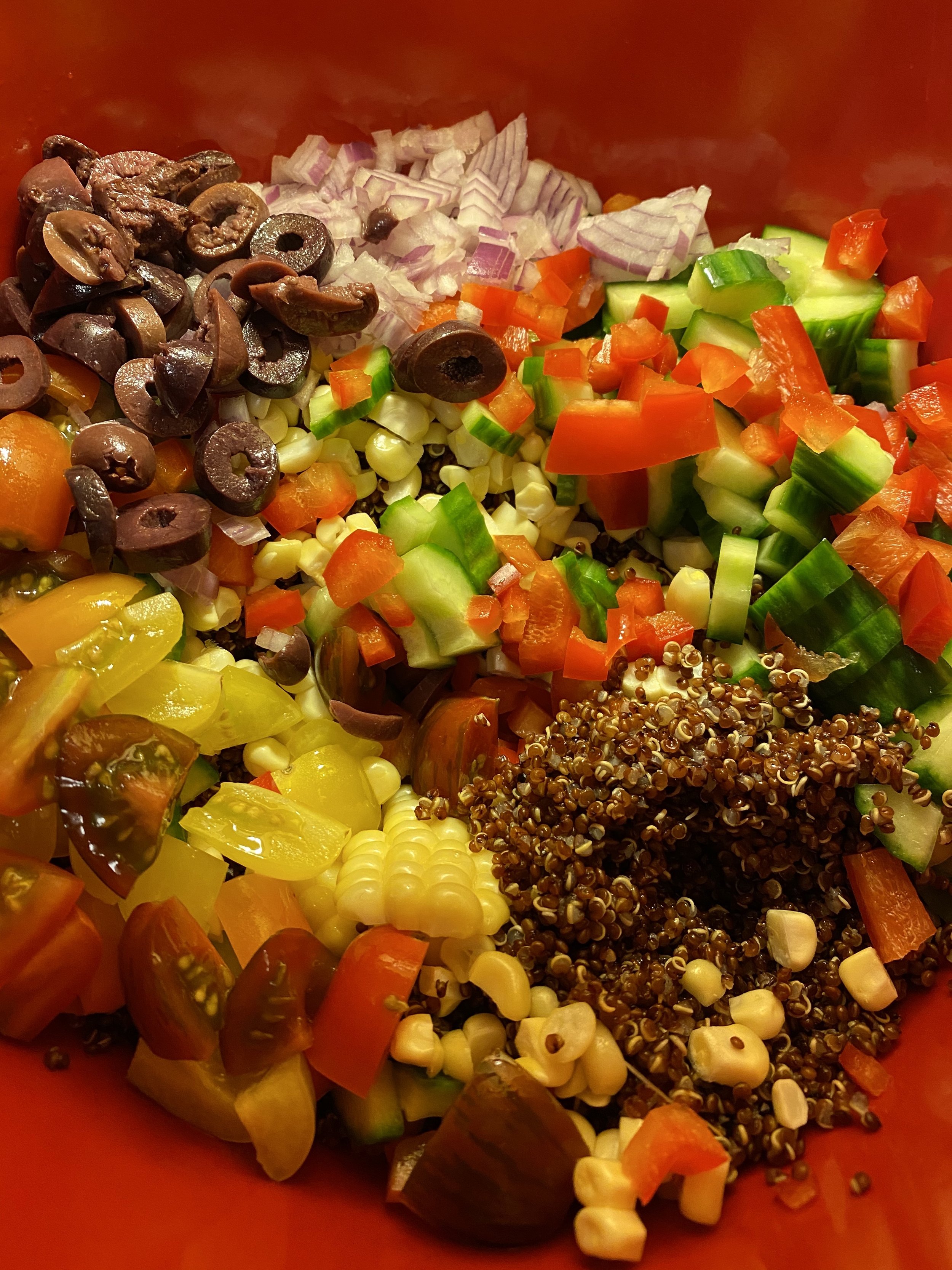 Red Quinoa with assorted veggies tossed in a basil vinaigette