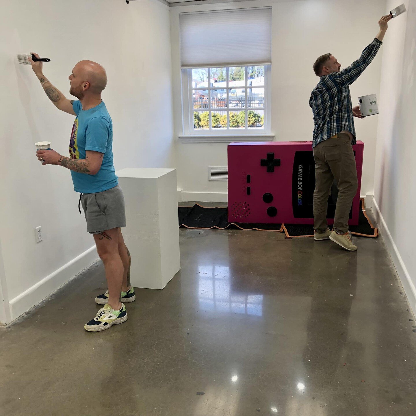 Touching up the walls for our two new shows opening Friday at 7pm. More info at https://www.diversityrichmond.org/iridian-gallery