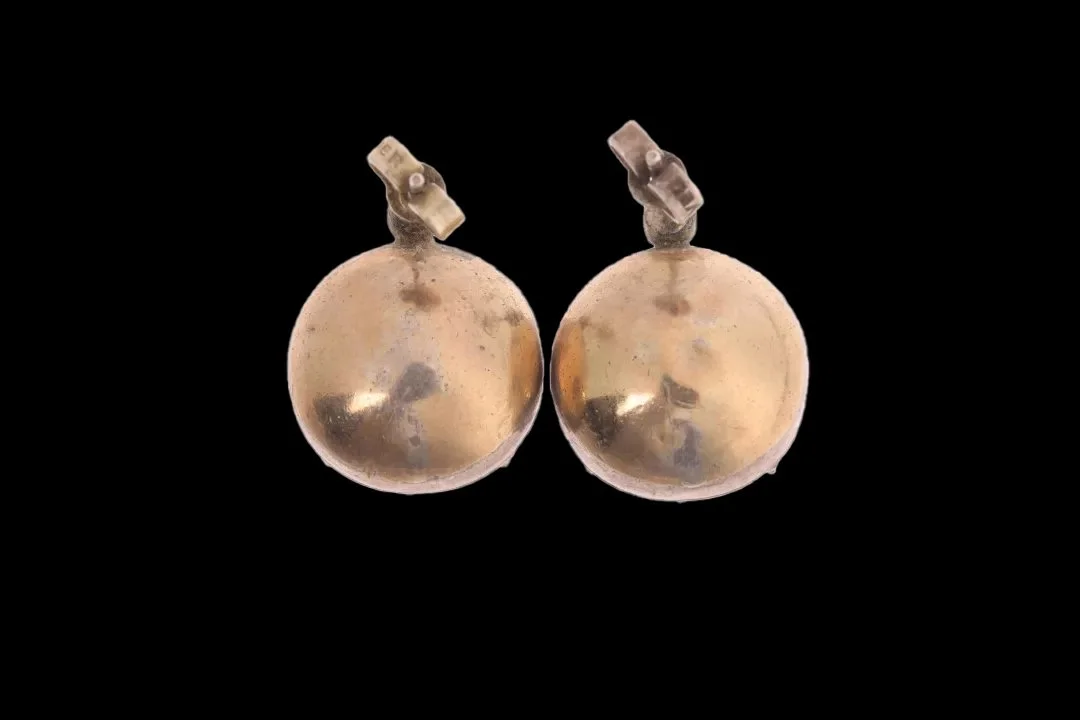 Reverse of Georgian gold and silver paste earrings showing smooth domed closed backs and stud fittings protecting the foil-backed stones.