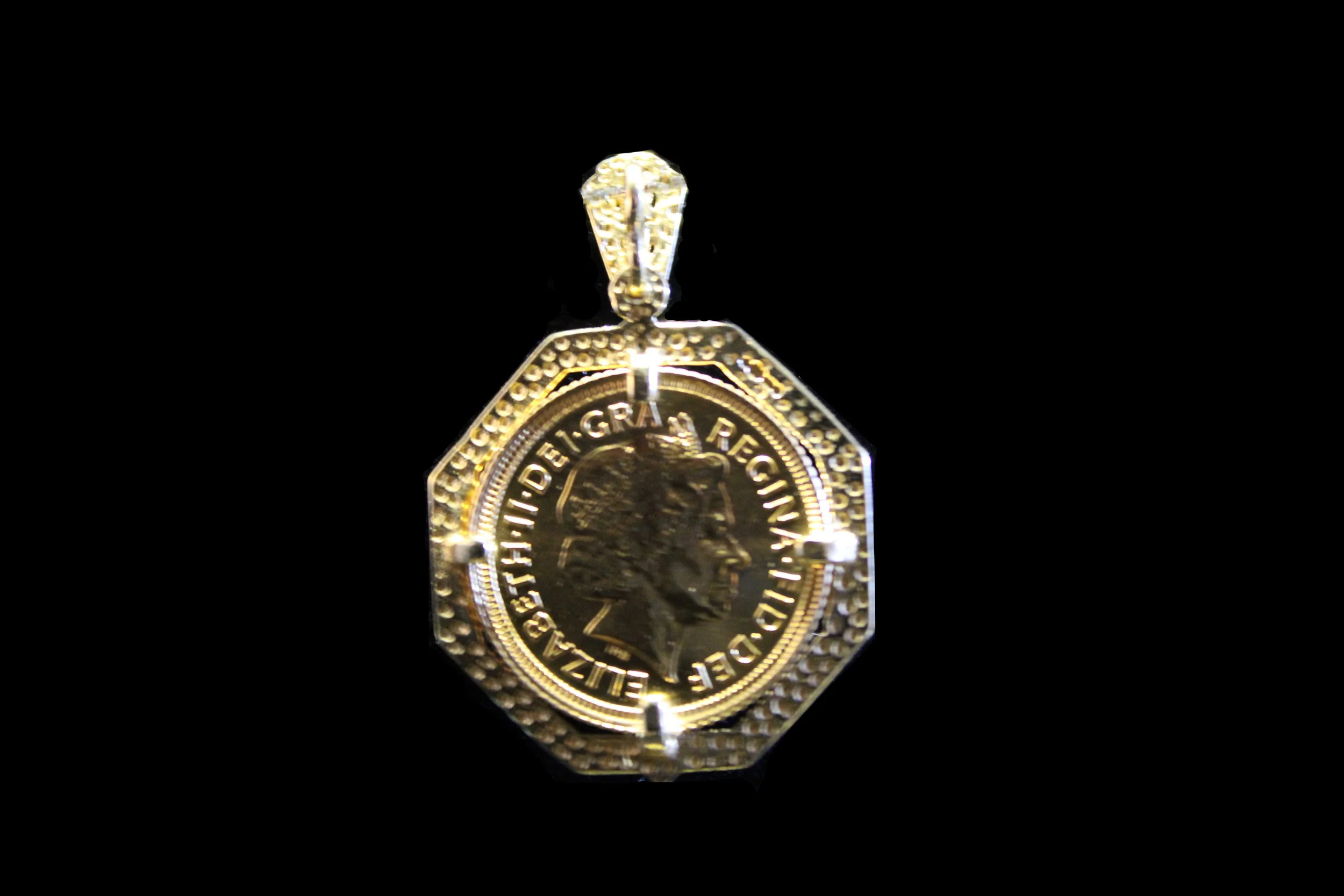 British gold coin pendant with Queen Elizabeth II portrait, mounted in faceted octagonal gold setting