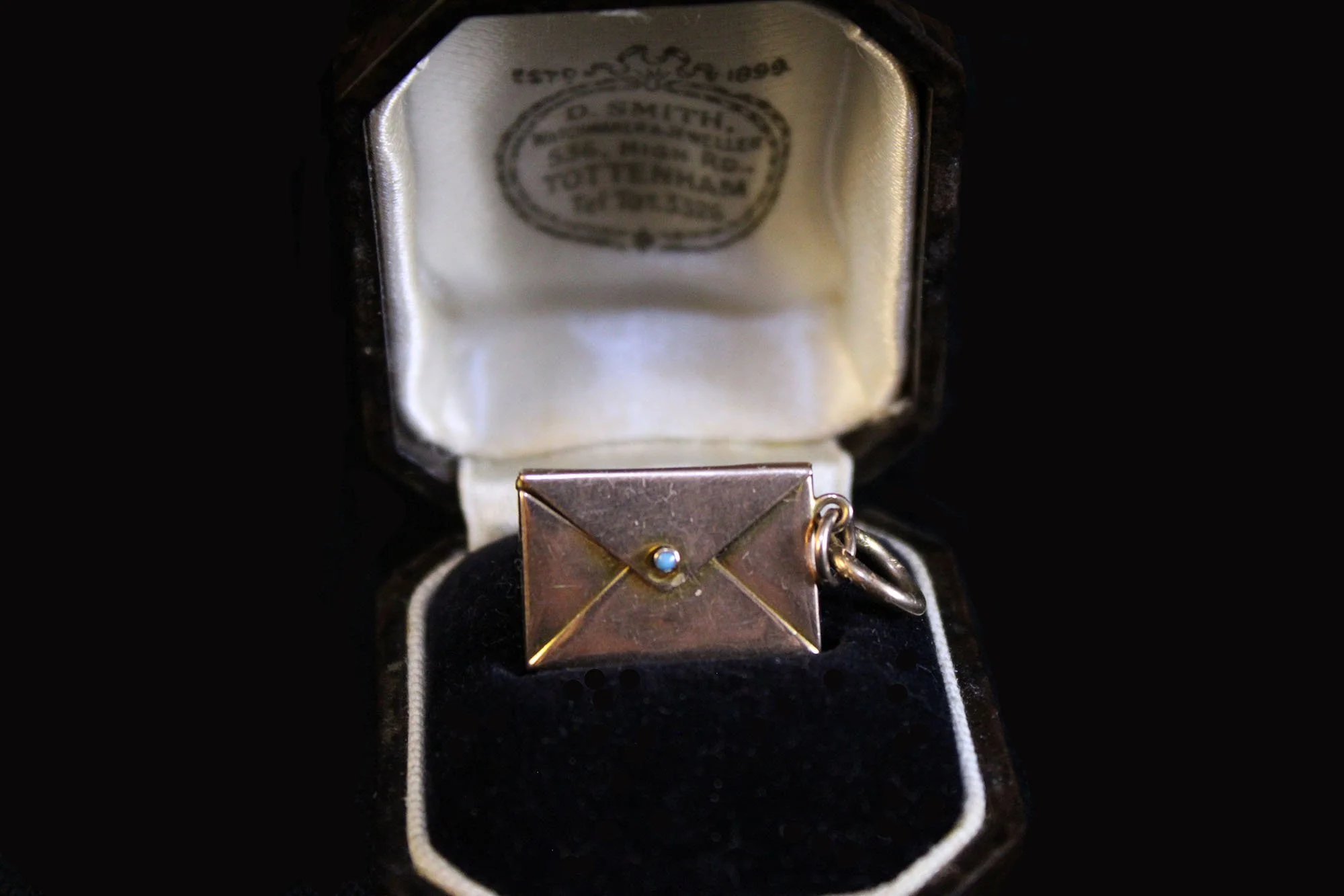 envelope in antique jewelry case