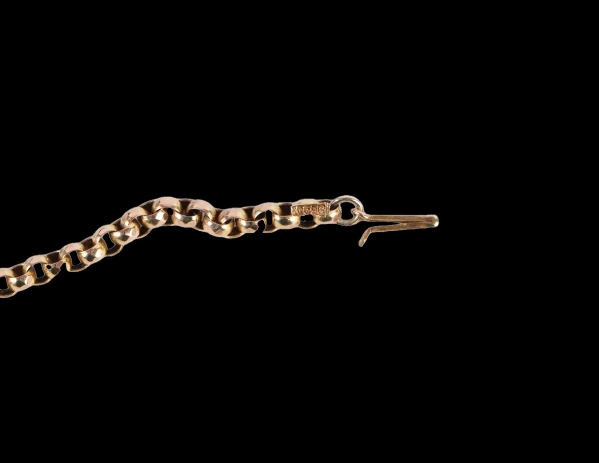 Close-up of Victorian gold cable links